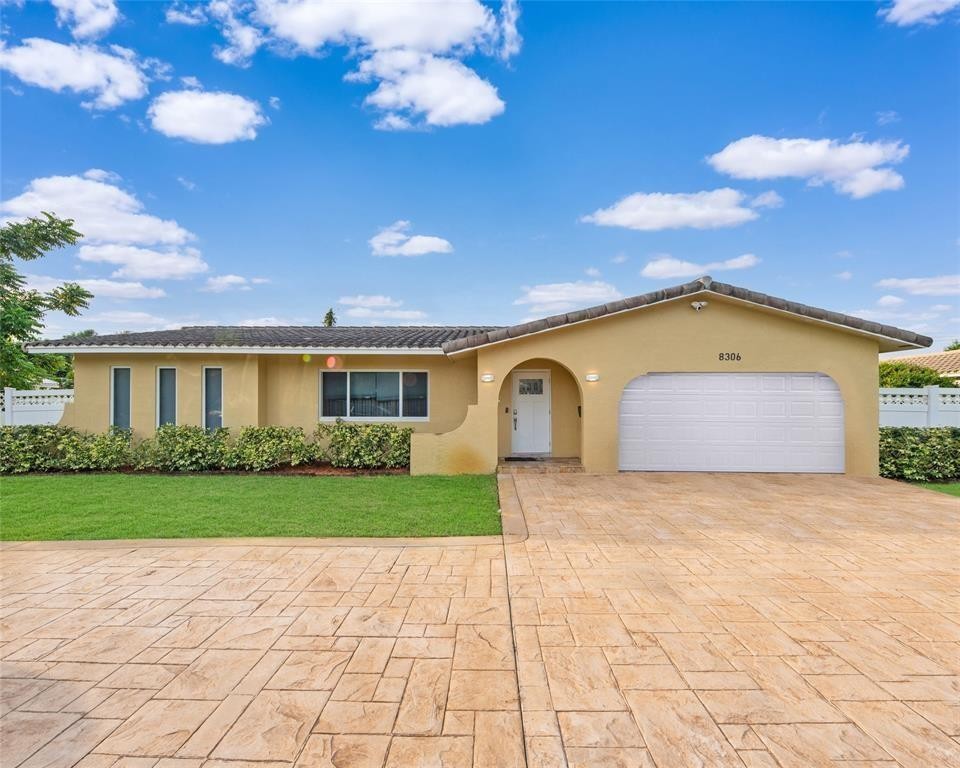 Well  maintained 4/2 pool home in Coral Springs. Updated kitchen, new appliances and bathrooms, new AC,  new tiles throughout the home with a spacious Florida room, split bedroom plan, Impact windows and garage door, Large back yard is fully fenced yard. The Pool was resurfaced recently and free of leaks.  XLarge driveway.  no HOA!  Close to Restaurants, hospitals, shopping and all major highway. Easy to show and ready to move.