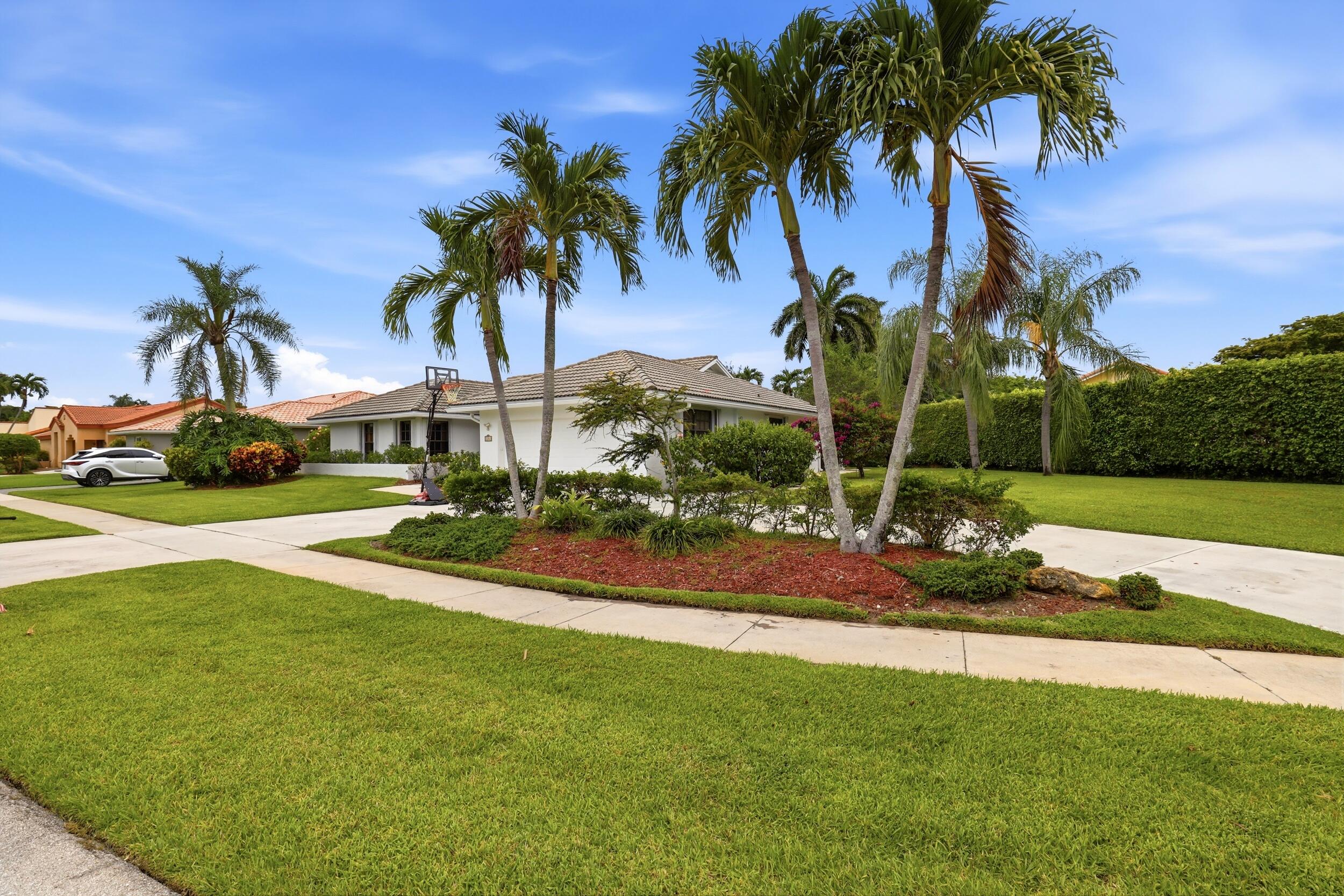 Rarely available in Estates of Silverlake! Situated on a private oversized pie-shaped lot with privacy hedge, this beautiful home offers two primary suites, each featuring walk-in closets with custom wood shelving. Huge family room could be a 3rd bedroom. Large great room. Vaulted and tray ceilings, porcelain tile throughout, and a spacious open layout create an inviting atmosphere. The kitchen features granite countertops, stainless Samsung appliances, Bosch dishwasher, and a large island seating six. Additional upgrades include an EcoSmart tankless water heater, Reme Halo whole-home air purification system, accordion hurricane shutters, circular driveway, 36 ft screened patio, insulated attic storage, transferable home warranty, and freshly painted exterior. Gated, pet-friendly community ABOUT THE COMMUNITY;  Estates of Silverlake is a desirable gated community in the heart of Boynton Beach, known for its spacious homes, oversized lots, mature landscaping, and quiet residential atmosphere. Residents enjoy a well-maintained neighborhood with tree-lined streets and a strong sense of pride in ownership.  Conveniently located near shopping, dining, medical facilities, golf courses, parks, and beautiful South Florida beaches, the community offers easy access to I-95, Florida's Turnpike, Downtown Delray Beach, Boca Raton, and West Palm Beach. Whether you're looking for a full-time residence or seasonal retreat, Estates of Silverlake combines privacy, convenience, and a relaxed South Florida lifestyle in one of Boynton Beach's most established gated neighborhoods.  LIVING IN SOUTH FLORIDA;  South Florida is renowned for its year-round sunshine, tropical climate, world-class beaches, championship golf courses, waterfront recreation, and vibrant lifestyle. Residents enjoy easy access to boating, fishing, dining, shopping, cultural events, and outdoor activities throughout the year. From the charm of nearby Atlantic Avenue in Delray Beach to the luxury shopping and dining of Boca Raton and Palm Beach, the region offers something for everyone while providing the warm weather and coastal lifestyle that make South Florida one of the most desirable places to live in the country.