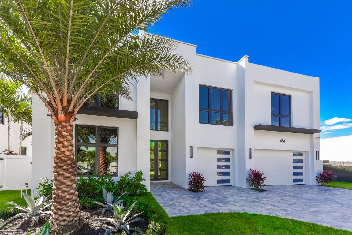 The Best of SoSo! Six bedrooms estate home just minutes from West Palm Beach's hot spots! Under construction by Mizner Development, this home features an open and airy floorplan, with six ensuite bedrooms, plus club room. Select from Mizner's most popular finished, or customize to meet your personal taste, a gorgeous gourmet kitchen with professional Wolf & Subzero appliances & Dekton Counters is included. Downstairs features an ensuite bedroom with outdoor access perfect for in-laws and guests, plus large club room. Upstairs you'll find five bedrooms, including a substantial primary suite with his and hers closets. Saltwater heated pool is included. Quality CBS construction with high-end finishes, impact windows and doors. Completion in 2025. Photos from previous build. Call for details.