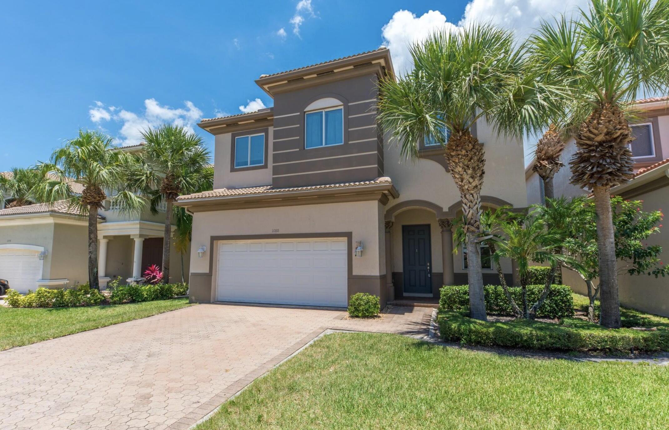 Welcome to this exceptional 5-bedroom, 3.5-bathroom waterfront residence in Palmyra Estates, Boynton Beach. This two-story single-family home offers 3,119 square feet of finished living space, providing ample room for comfortable living and entertaining. The property features a two-car garage for convenient parking and vehicle storage. Positioned on waterfront property, this home captures a unique setting that enhances its appeal and lifestyle possibilities. Located in the Palmyra Estates community, this residence presents a wonderful opportunity for those seeking a spacious waterfront home in Boynton Beach.