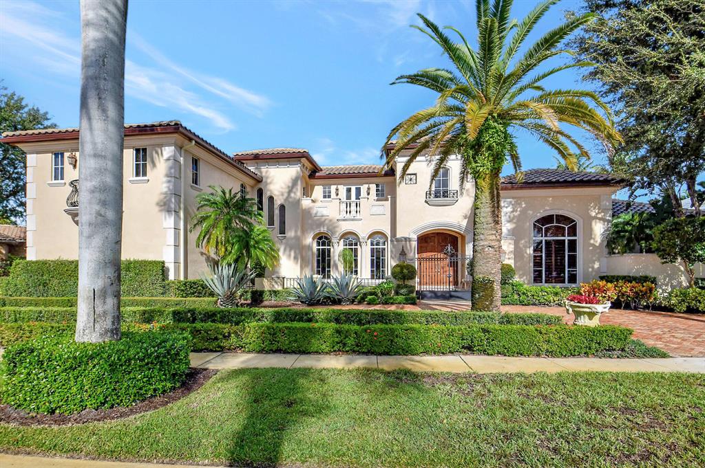 Incredible estate home with fabulous lake and golf course views. This 5 bedroom plus two custom designed offices has Architectual features thru out. The kitchen family room & living room has gone thru a complete update with the finest materials and style. Travertine marble floors, all impact glass, and a roof that was just completed. The state-of-the-art kitchen includes double sub zero refrigerator and freezer, Miele ovens, microwave, hand touch dishwasher, and gas stove top. Also included in the outstanding home is a full house generator and water filtration system. Truly, no detail has been overlooked in this amazing home. Custom bar which overlooks the living room includes a gas fireplace w/a magnificent mantel. You will enjoy the 1st floor primary suite that features a separate sitting area, oversized custom fitted closets plus complete "work out" room next to the separate his/her bathrooms. Also downstairs is an additional bedroom w/bath. Upstairs features 3 full bedrooms plus bath on suite and a secondary built out office. to finish off this breath-taking estate is the most picturesque backyard with large, covered patio and full summer kitchen. Gorgeous gardens, large swimming pool with separate spa all overlooking a long lake and golf course views. This absolute beautiful home has a circular (long) driveway plus a 4-car garage and is truly a must see.