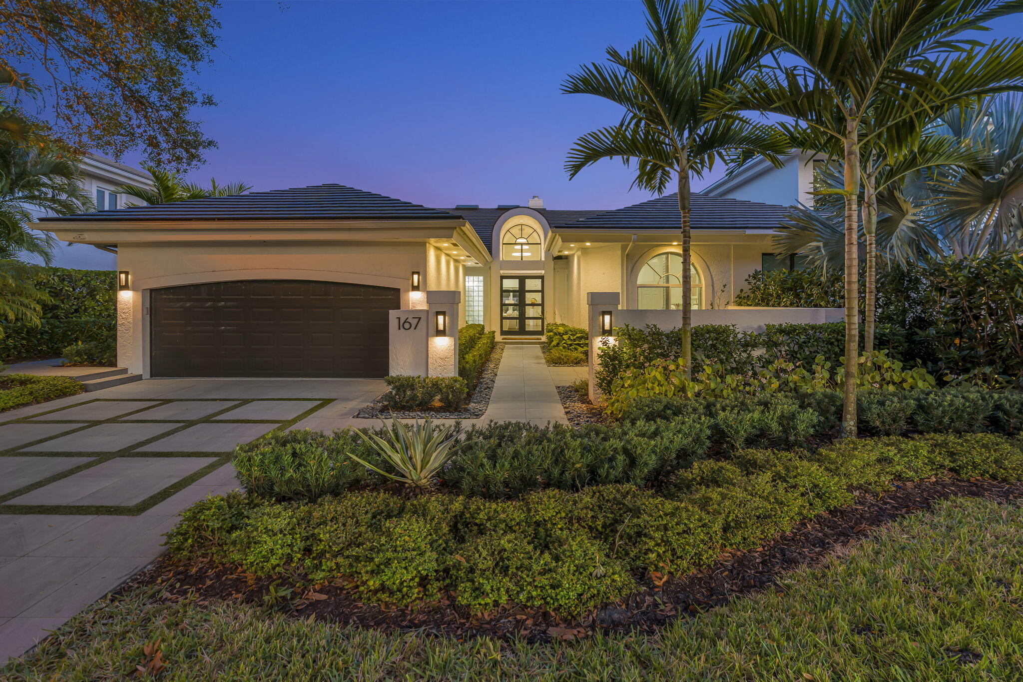 Comprehensively upgraded waterfront 3BR/3BA residence, each bedroom en suite, w/significant capital improvements completed 2022-2025. New roof (2023/2024). Newly constructed dock w/upland seating area, full-service pedestal (water/power/lighting) & 24K lb boat lift. Renovated saltwater pool & spa finished with new patio pavers & cable rail system. Retractable screens create seamless indoor-outdoor living.
Complete reimagining of hardscape and landscaping w/new irrigation & architectural lighting. New driveway & statement front entry. Exterior paint '23. Custom interior bar w/built-in cabinetry. HVAC replaced '25 &  whole attic dehumidification system installed. Private dockage w/direct access to open water, complemented by 45 holes of championship golf & the full luxury club amenities. While information is believed to be accurate, it is provided without warranty and is subject to errors, omissions, prior sale, or withdrawal without notice. All measurements and representations should be independently verified.