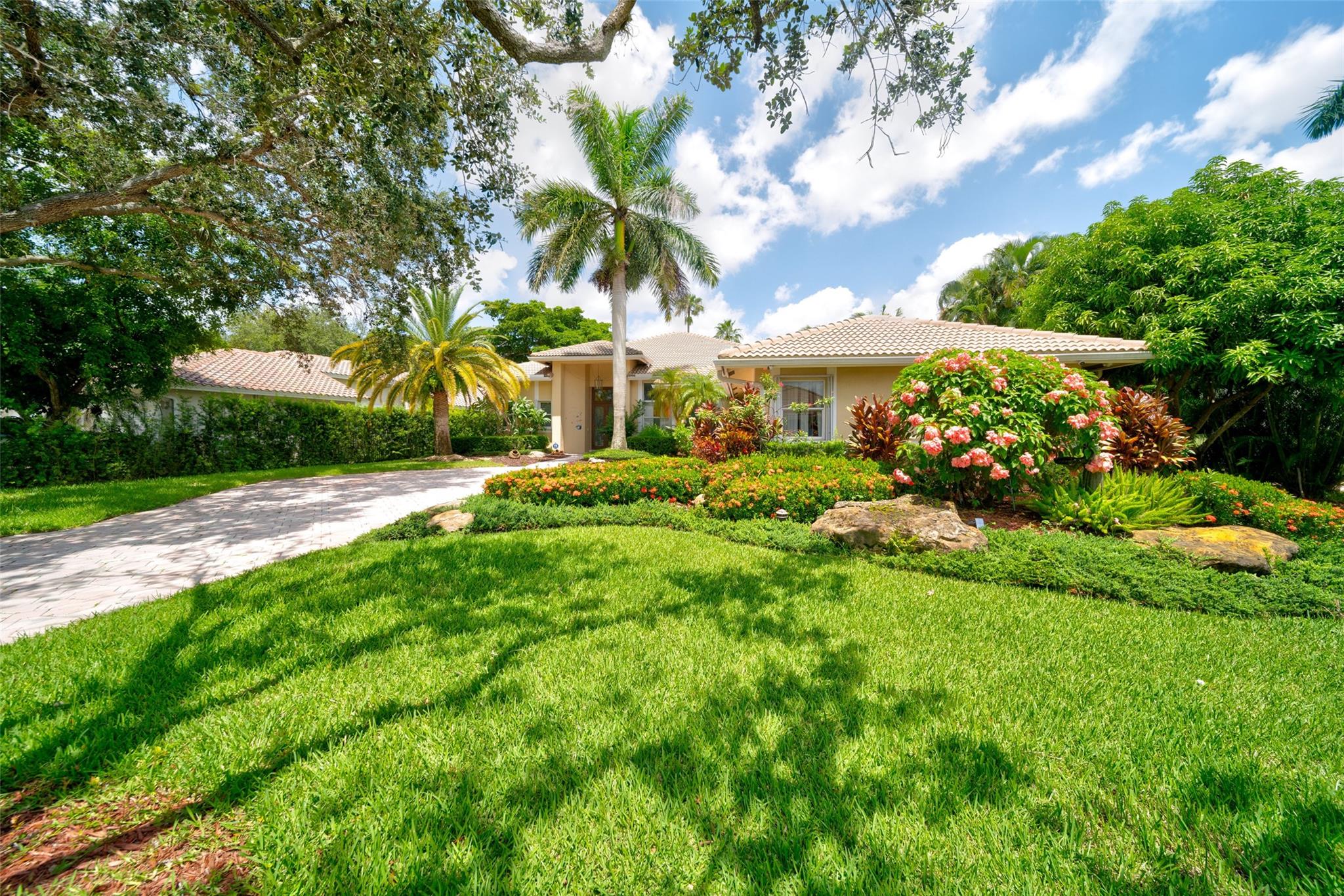 NEW ON THE MARKET !!!( DOM not correct)  Amazing 4 Bed 3 Full Bath Triple split pool home located in the prestigious The Isles community. Remodeled kitchen, bar area, granite countertops, high-end appliances, New Dishwasher,  Refrigerator and stove top!  Custom entertainment center and TV convey and  make this home perfect for entertaining. The living area has custom baseboards and crown molding with oversized marble flooring! 2 New high-efficiency A/C units, NEWER ROOF - 9 years Old, impact doors and windows, and accordion shutters. The garage has custom high-end built-in metal cabinets with an insulated garage door. Lush landscaping with beautiful curb appeal. Entertainment Center and TV Convey
