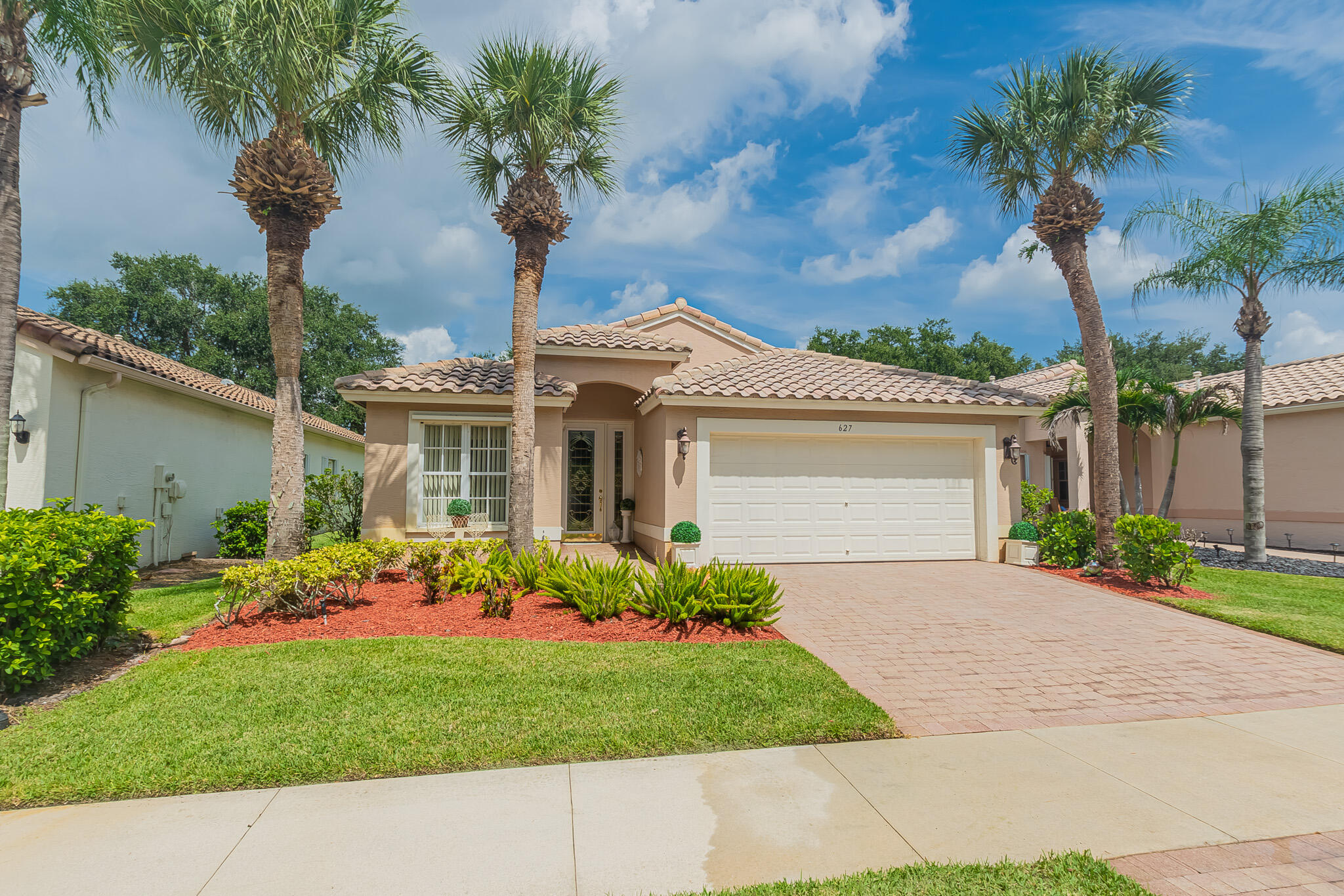 Welcome to this beautifully maintained 2BR/2BA/2CG home in the desirable 55+ Cascades at St. Lucie West! Enjoy a spacious backyard with peaceful preserve views. The open great room offers combined living and dining areas. The renovated kitchen features 42" wood cabinets, quartz countertops, stainless steel appliances, a gas range, breakfast nook, and a pass-through to the dining area. The primary suite includes a walk-in closet and bath with dual sinks and a walk-in shower. Additional features include a laundry room, Berber carpet, newer tile in the guest bedroom, enclosed Florida room, 2021 A/C, and newer water heater. Resort-style amenities include a 26,000 sq. ft. clubhouse, golf, tennis, fitness center, tiki bar, and more. HOA includes lawn care, cable, internet & 24/7 manned security.