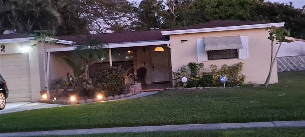 A gorgeous 3/2 property with a bonus room. Just off the C-14 canal, enjoy your morning coffee watching the sunrise from your screened patio in this impeccably maintained home overlooking a serene waterway. Community boat ramp within walking distance from the house. Spacious home with large rooms and a Florida Room, large kitchen with Silestone countertops, stainless appliances, and new tile in the main living area. Fully automated sprinkler system which runs off the canal. The pool area is screened and includes a large covered patio. There is an additional open patio in the front. Accordion shutters in the front and back. Fenced yard with mango trees and more. NO Association! Previous owners converted the garage to the 4th bedroom - can easily be converted back.SEE THE BROKER REMARK INFO