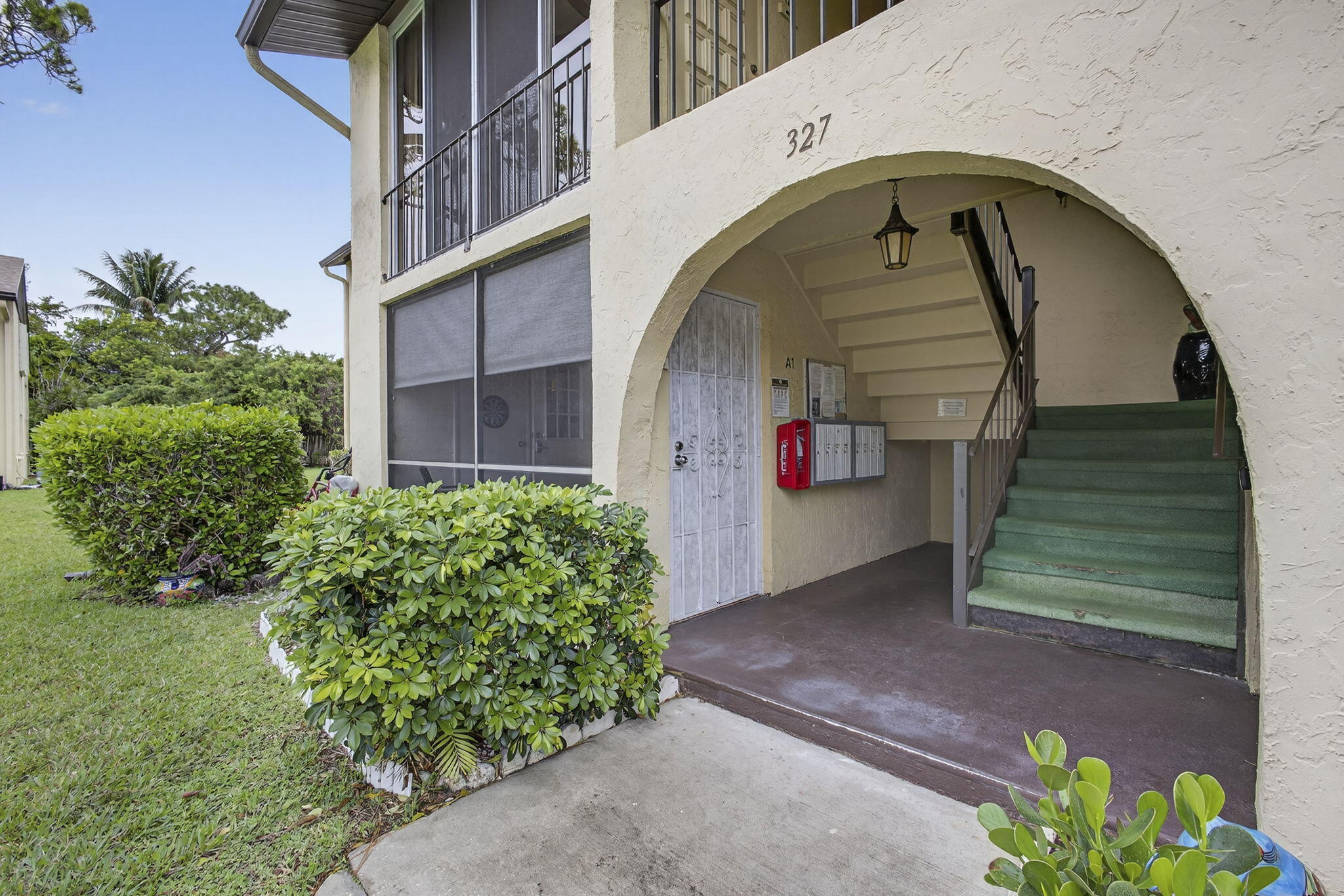 Welcome to Pine Ridge III, a vibrant 55+ no-pet community. Residents enjoy a clubhouse, sparkling pool, shuffleboard, bocce, and pickleball courts, with a scenic lake, complete with a walking trail. This first-floor, corner-unit condo features 2 beds and 1.5 baths ready for a new owner. Seasonally owned and well-maintained, the home includes a dedicated parking space just steps from your front door. Along with a screened patio with a view of the pool area located across the street. Inside, the condo boasts laminate flooring, updated kitchen, and the convenience of an in-unit washer/dryer. Both bedrooms offer spacious walk-in closets, and bathrooms have been tastefully updated, providing comfort and modern appeal.