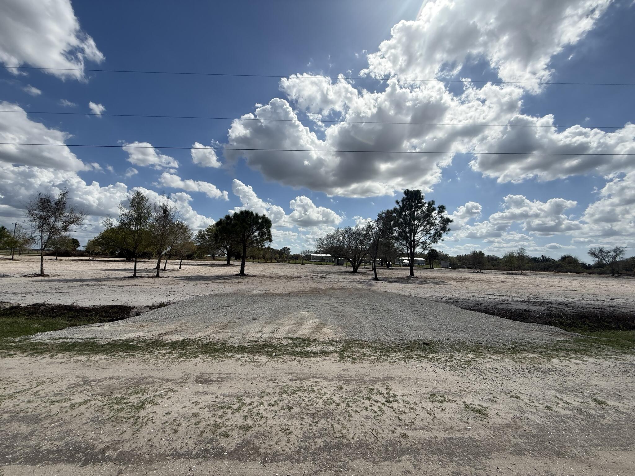 Build or bring your dream home on this cleared 5 acre lot. This lot is ready for your vision and features a culvert already in place for convenient access. Situated on a desirable corner lot in Viking Estates, the property offers easy access to E Line Rd and is just minutes from Hwy 441. High and dry with no flood zone, this land provides the perfect setting to build your dream home, establish a private retreat, or bring your animals and toys. With power available nearby and plenty of space for multiple entry points, this versatile property is ready for development. Buyer to perform their own due diligence regarding land use, zoning, and utilities.