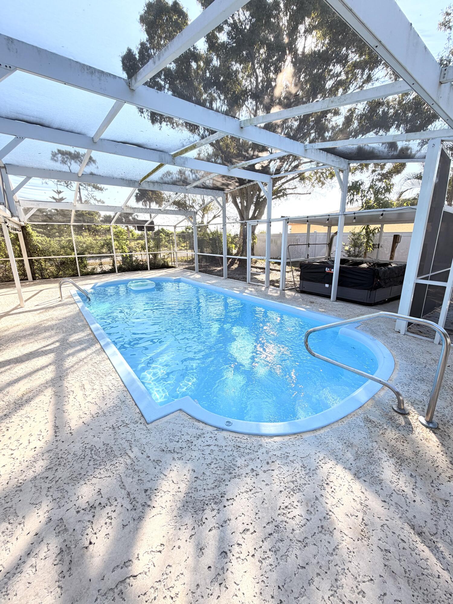 Welcome to this fully renovated home featuring a large heated pool in a private backyard, perfect for relaxing or entertaining. Recent improvements include quartz countertops, a brand-new roof, and a new water heater.  Situated on a large corner lot, the property offers two separate driveways, with one providing the perfect space for a boat, trailer, or additional parking.  Located in a quiet, family-friendly neighborhood just minutes from parks, schools, grocery stores, shopping, and the beaches, including Sebastian Inlet State Park.  The home may also be sold furnished, offering a truly move-in-ready opportunity. Seller financing may be considered.