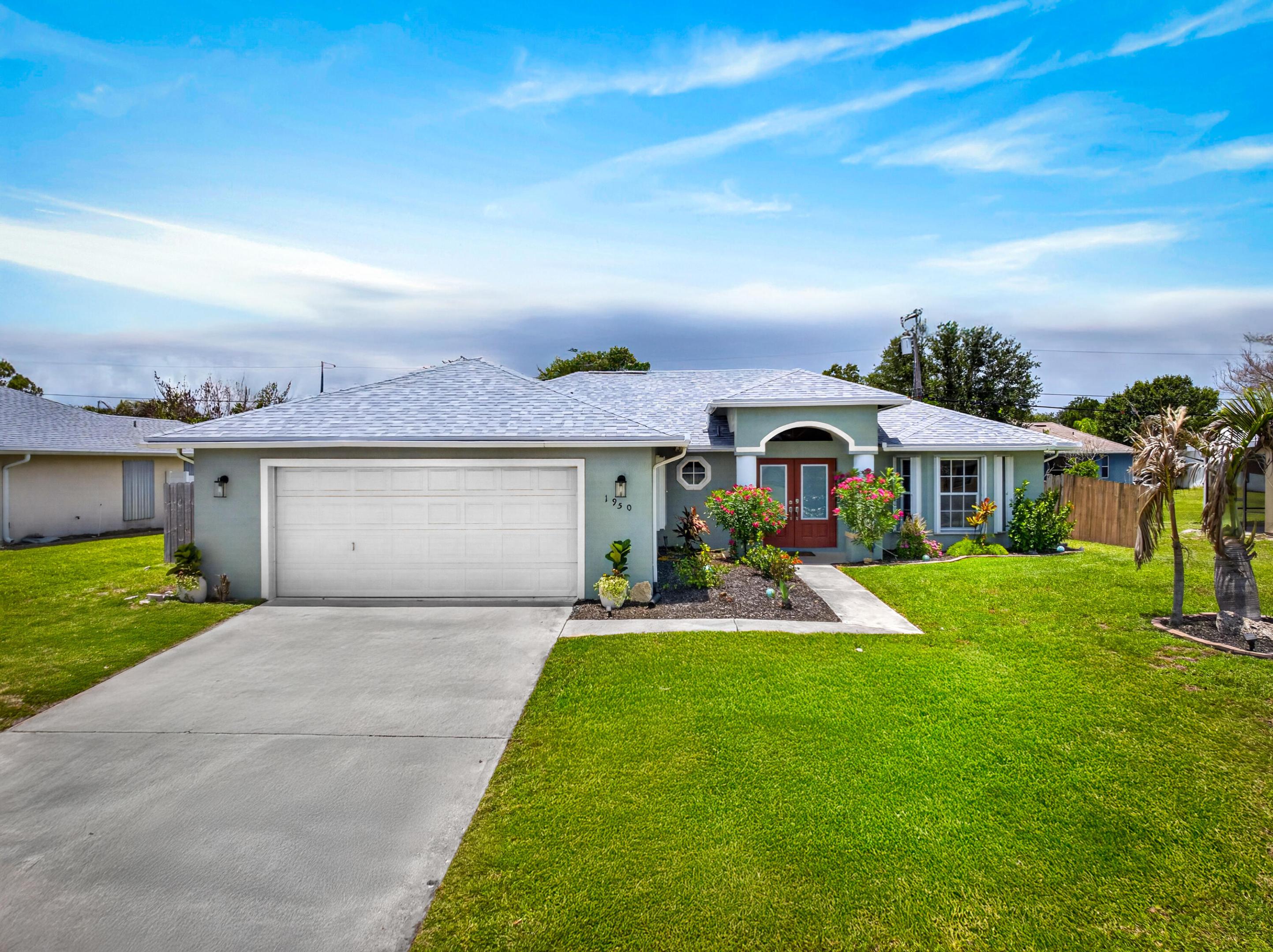 Welcome to this beautifully maintained 3-bedroom, 2.5-bath pool home nestled in the thriving community of Port St. Lucie. Thoughtfully updated with a brand-new roof for added peace of mind, this home offers both comfort and convenience. Step outside to your private screened-in pool area featuring a new pool pump, ideal for relaxing afternoons or entertaining friends year-round. Inside, you'll find a cozy space with a desirable split floorplan and a spacious, versatile flex room perfect for a home office, fitness space, or media room. Combining style, functionality, and exceptional value in one of the area's fastest-growing locations, this home is a wonderful opportunity to enjoy the Florida lifestyle at an affordable price.