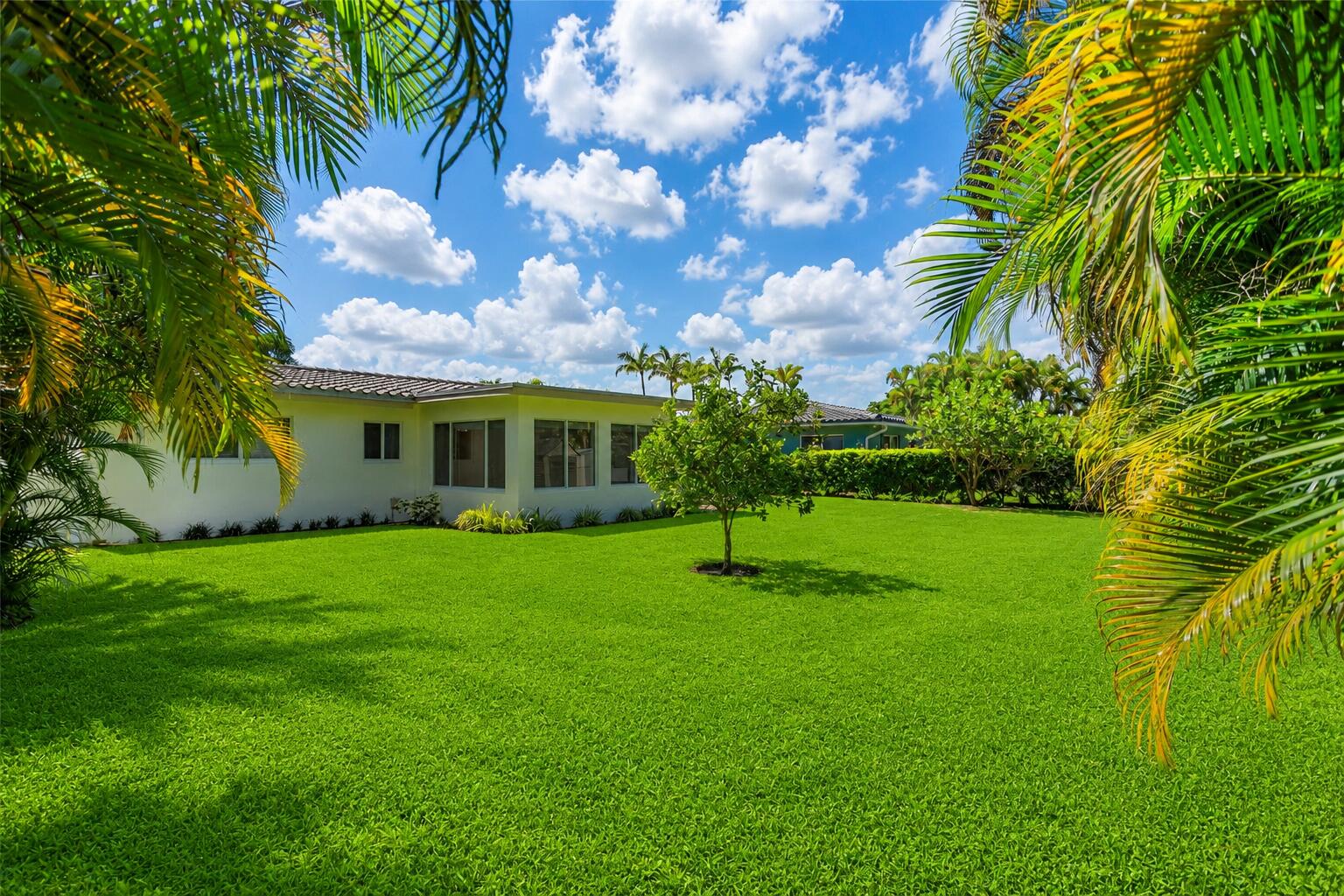 Welcome to Floranada Ridge! This 2-bedroom, 2-bath home offers 1,425 living sq ft on an oversized 71' x 126' lot with room for a pool or future expansion. Recent updates include a new S-tile roof (2021), hurricane-impact windows and doors, remodeled bathrooms, updated electrical panel, fresh exterior paint, and tile flooring in the kitchen and family room. The open kitchen flows into the dining area, while most rooms overlook the large fenced backyard. Additional features include an inside laundry room, central A/C, circular driveway, carport, and transferable termite warranty. Conveniently located near beaches, shopping, dining, schools, and healthcare. Priced to sell!