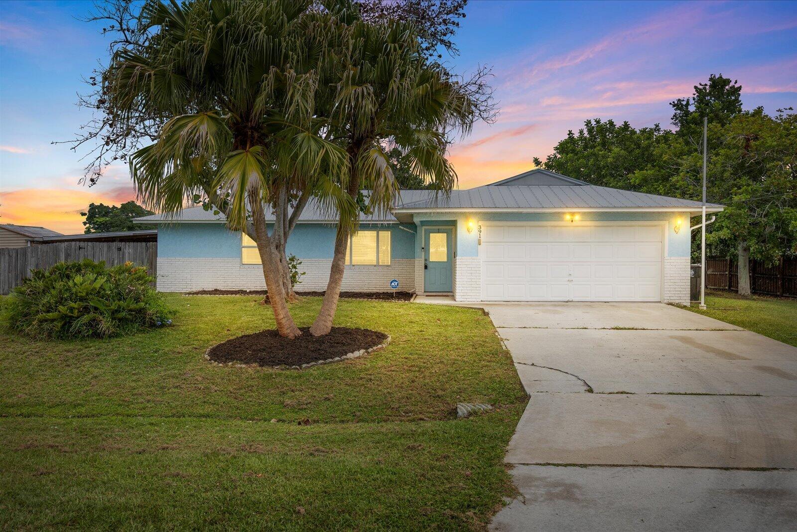 Prepare to be impressed by this exceptional residential opportunity in the heart of Port St. Lucie. Perfectly positioned on a sprawling, premium corner lot, this property commands immediate attention with its brand-new aluminum roof. Inside, the thoughtfully designed split-bedroom floor plan features 3 bedrooms and 2 full bathrooms, seamlessly extending into an enclosed all-season room with a cabana bath designed for effortless indoor-outdoor living. Located just minutes from premier shopping, dining, pristine parks, and schools, this home offers an enviable lifestyle with swift highway access for effortless commuting. Experience it in person today and make this home yours.