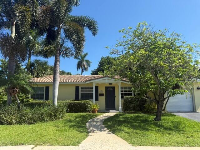 Rarely available in Boca Raton Square, this well maintained & charming 3-bedroom, 2-bath pool home offers an exceptional opportunity to enjoy the East Boca lifestyle. Freshly painted and move-in ready, this home offers 1,383 living square feet, including an open floor plan with an expanded living room area.    The ample and practical kitchen features granite countertops and stainless steel appliances with a convenient eat in counter area. The private backyard retreat includes a heated pool and spa, mature fruit trees, and a spacious yard ideal for outdoor dining, barbecues, entertaining, and enjoying South Florida living.  Additional features include a 2021 HVAC system, a 2013 roof, full storm protection, updated electrical panels, and a newer washer and dryer.   Situated in the highly sought-after Addison Mizner Elementary school district and conveniently located near parks, shopping, dining, downtown Boca Raton, approximately 30 minutes from either FLL or PBI airports and just 4 miles from the beach, this home checks a lot of boxes!