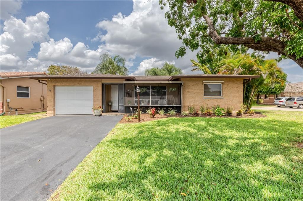 LIGHT, BRIGHT REMODELED HOME. Located in the quiet, well-kept community of Crystal Lakes, this renovated home features: updated kitchen w/granite counters, wood cabinets & flush mount sink; updated bathrooms w/ granite counters, custom mirrors & fixtures & beautifully tiled showers; tile & wood flooring; newer appliances (2019), roof (2013), AC (2019) & water heater (2018); custom blinds/shades; hurricane shutters & rated garage & front door; large laundry w/ extra AC Unit; sprinkler system on timer & much more. Office can be closed in for 3rd bedroom. Low HOA fee includes: lawn mowing & tree trim; house painted every 5 YEARS & Clubhouse w/ heated pool & spa, gym, library & billiard room. Centrally located near I95 and the Sawgrass Expressway.