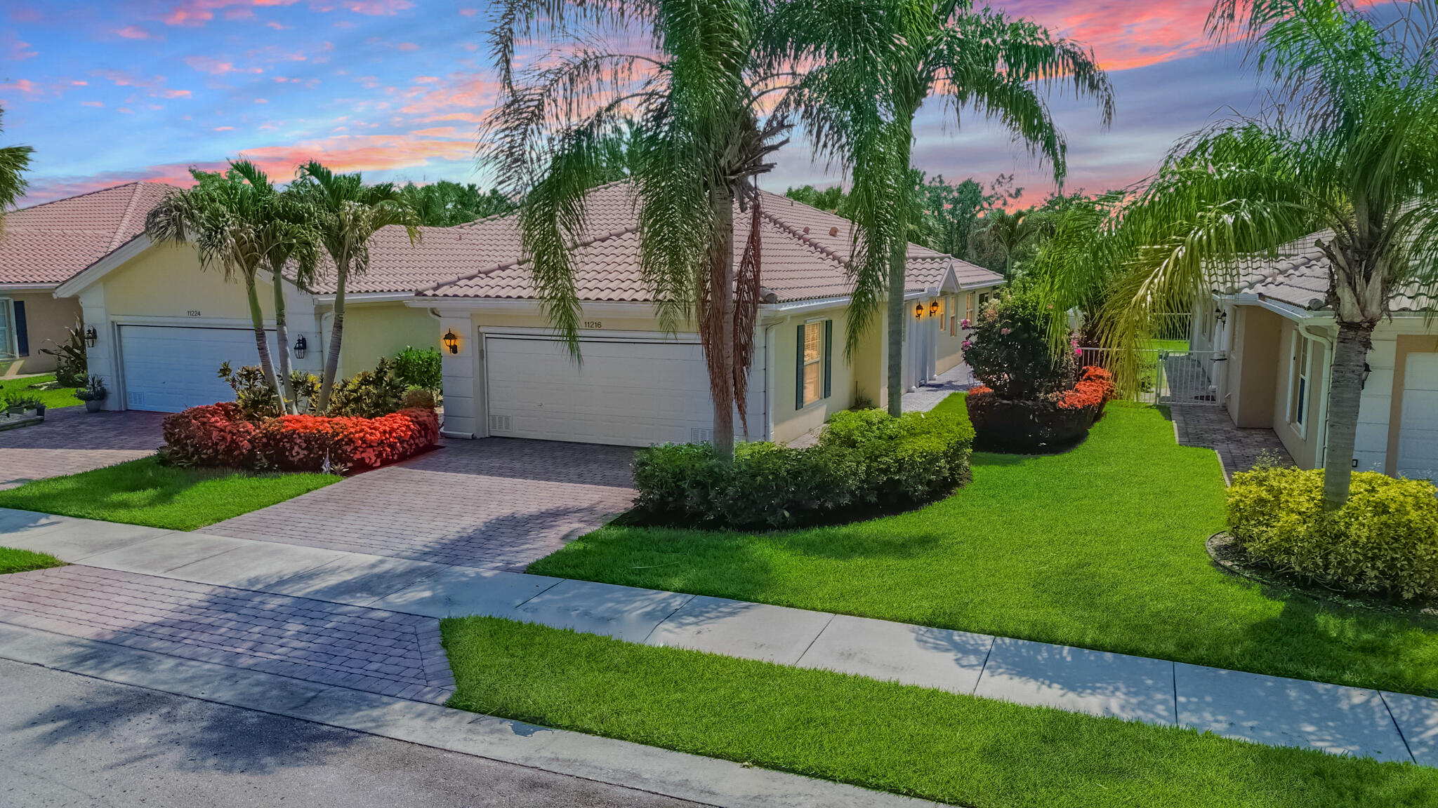 Lakes at Tradition!  Beautifully updated 2/2/2 Villa.  Interior offers tile flooring in the main areas, with new carpet in the bedrooms.  Modern kitchen with granite counters, stainless appliances, 42" custom cabinets, a pantry, and a breakfast bar open to the living/dining area.  Enjoy a private backyard with lush landscaping and a covered, screened lanai with a sun shade. The garage includes custom floors and a remote-controlled screen. HOA dues provide lawn care, cable, internet, exterior painting, pest and irrigation system maintenance.  Community amenities feature a resort-style pool and fitness center. Excellent location close to all that Tradition has to offer.   this is a must see!