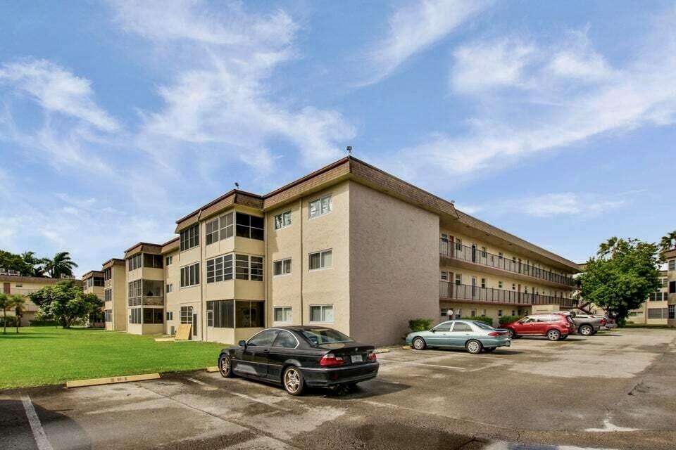 Completely renovated first-floor 55+ condo that feels like new   Highlights you'll love: • First-floor unit — easy, convenient living • Impact windows for peace of mind • Bright, updated kitchen with granite + stainless steel • Clean wood-look flooring throughout • Beautifully updated bathrooms with walk-in shower • Enclosed patio = extra space to relax  • Assigned parking right in front  Big updates already done (2020): • A/C • Water heater • Electrical panel & outlets  Nice extra touches: • Shiplap accents • Remote-controlled fans • Sliding/rolling door in second bedroom  Community: Lakeside Village — well-kept, peaceful, with a pool, clubhouse, fitness center, walking paths, and more   Immaculate and truly move-in ready... this one just feels right