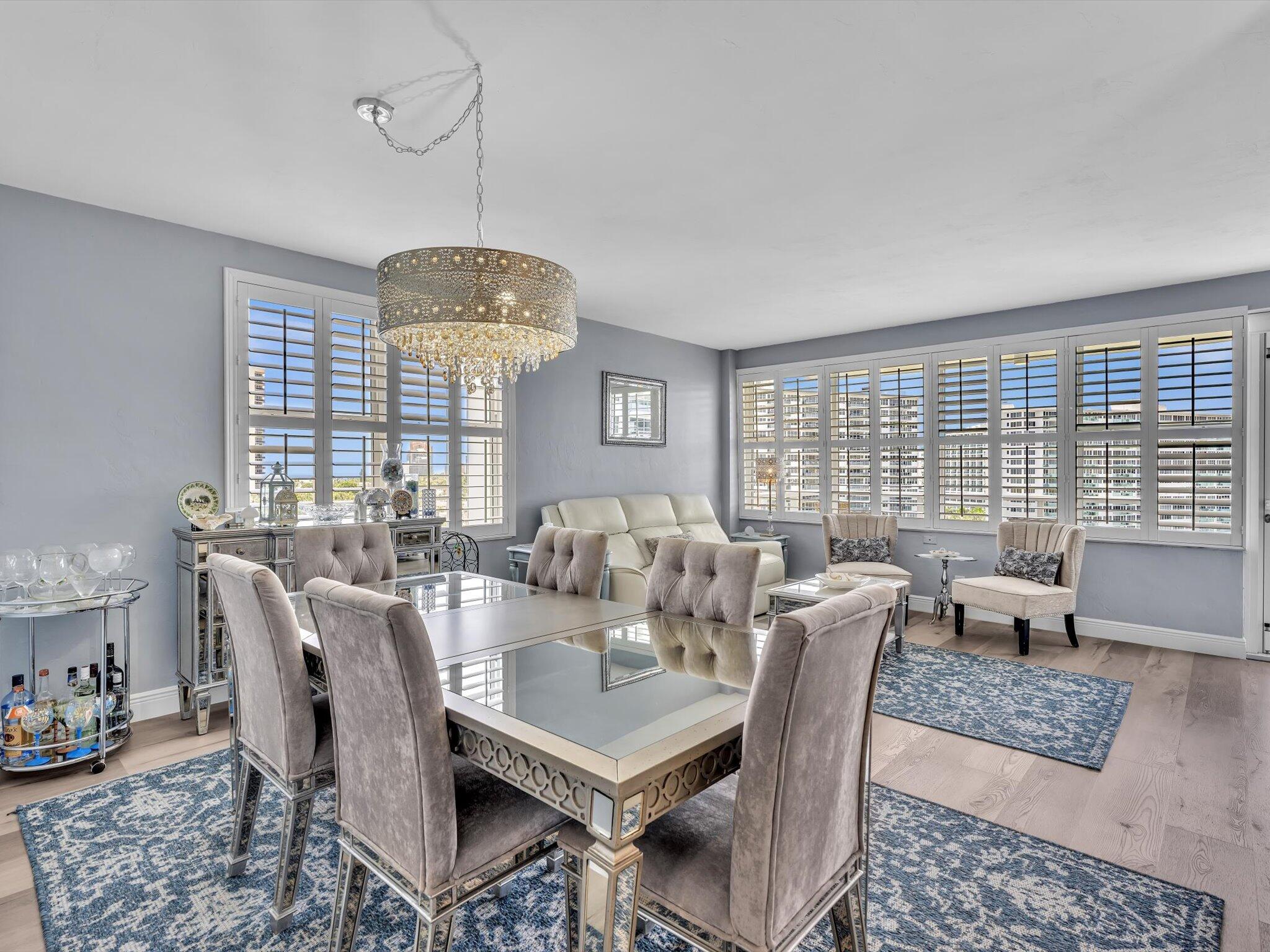 Move-in ready beautiful corner Residence on the 10th floor with Ocean views AND IntraCoastal views plus the pool view. Yes, you can have it all. Excellent location across the street from the beach. All new kitchen with granite counter tops and soft close cabinetry. Lovely updated baths and light fixtures. Building has over $3M in reserves with no pending assessments, 24/7 Security, HUGE heated pool and 5 acres of resort style landscaping. Bocce ball, bbq plus Intracoastal Clubhouse with new dock and raised seawall. You've earned it. Come enjoy the good life.  55+ Cash only.