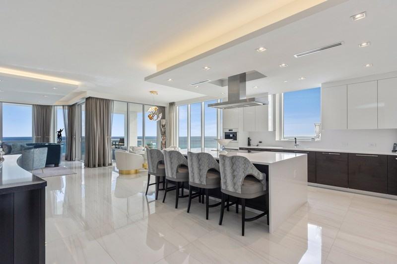 Magnificent residence in VistaBlue Singer Island, boasting the most sought after Southeast Direct Ocean views! This custom 4 bedroom, 4.5 bath residence has upgrades above and beyond with custom mill work and floating ceilings, soundproof music room, built-in wine storage, custom closets, unique custom lighting, Lutron Solar shades throughout with blackout shades in Master Suite, custom whirlpool tub, Kohler Veil Intelligent Toilets, custom doors and much more. VistaBlue offers ocean-front living in a luxury high-rise on Singer Island providing residents unparalleled features and amenities. 58 residences with Italian porcelain flooring, top of the line Poggenpohl custom cabinetry, quartz countertops, Miele high-end appliances, high-impact glass and oversized wraparound balconies. Five-star amenities include gated entry with security, on-site concierge, an elevated pool terrace overlooking the Atlantic Ocean, cabanas, spa pool, wine bar and wine storage locker, state-of-the-art fitness center with men's and and woman's luxury locker rooms with sauna, social lounge, boardroom, clubroom and an expansive pristine private beach. Comes with 2 side-by-side parking spaces, 10-foot ceilings throughout and air-conditioned storage.

This residence has it all including direct ocean-front and sunrise to sunset views, ocean and intracoastal waterway and panoramic views from each and every room!

Bring your clients, they will not be disappointed!
