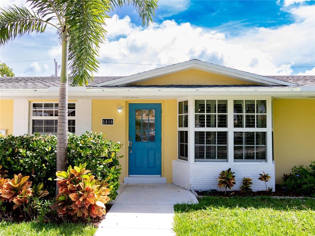 Stunning 3 bedroom, 2 bathroom home located in desirable Lighthouse Point featuring a split floor plan and a spacious living room/dining area that leads to a nice sized Florida room. This lovely home has a gorgeously remodeled kitchen with stainless steel appliances and granite countertops as well as a utility room with washer/dryer and additional storage. The bathrooms have been beautifully updated also. This well-maintained home offers a large back yard that includes an outdoor kitchen and plenty of room for a pool. In 2019, the electric was upgraded and both the AC and roof were replaced. Hurricane Impact windows all throughout with convenient generator hookup. Tankless WH, 5 years old. Stove offers gas hookup.