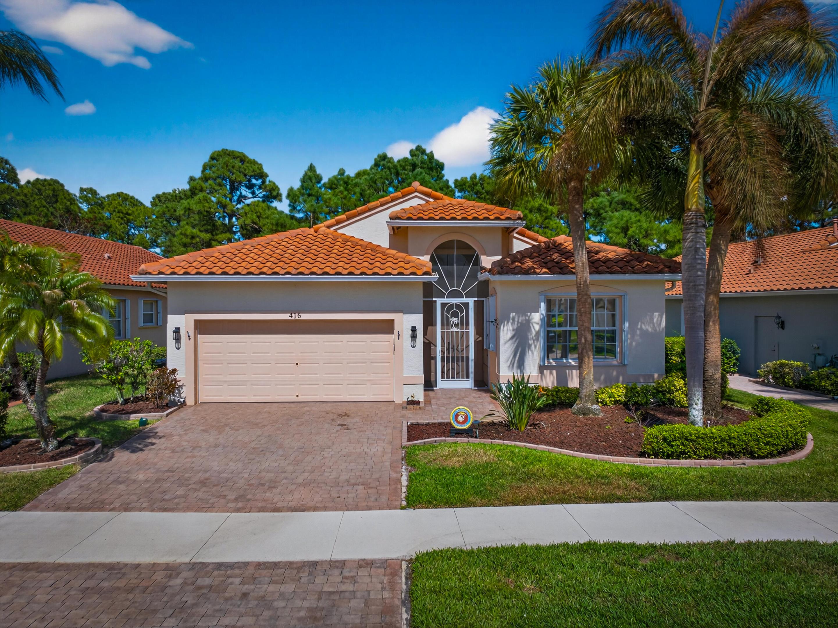 Experience refined living in this beautifully appointed Ruby model in the prestigious Cascades at St. Lucie West. This residence offers an inviting open layout filled with natural light and thoughtfully curated details throughout. The kitchen features 42" cabinetry with pull-out shelving, updated appliances, and seamless flow into the main living areas—ideal for entertaining. Custom window treatments, upgraded lighting, and designer ceiling fans enhance the home's polished feel. Enjoy a tiled, screened lanai overlooking a tranquil private preserve. Located in a premier 55+ gated community with golf, tennis, pickleball, and a 26,000 sq ft clubhouse. HOA includes cable, lawn care, and guard-gated security.