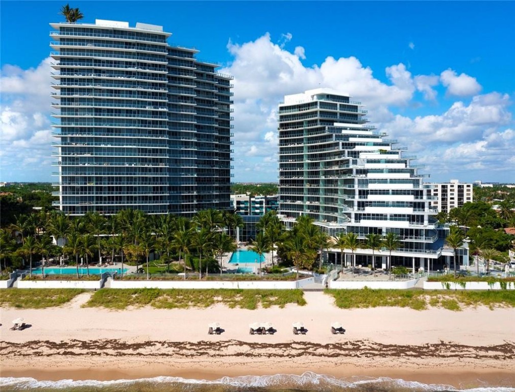 Direct oceanfront facing stunning double residence enjoys prime location in the South Tower of the world class Auberge Residences & Spa offering unrivalled amenities. Expansive balconies, mesmerizing ocean & intracoastal/city views! Seeking a truly open floorplan perfect for entertaining or the ultimate modern oceanfront lifestyle? This residence has beautifully customized with a wide open great room, expansive chef's kitchen, casual dining island & bar - all open to family room & dining area. The home office is currently 5th bedroom plus there is an additional family or media room. Master suite is privately located oceanside with a spa bath & large closets. Three additional bedroom suites are well located on the other wing of the residence. Large laundry/storage room + 4 parking spaces.
