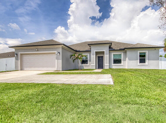 Practically perfect POOL home just in time for summer! Rare 4/BR/3BA plus Den pool home in the heart of Port St. Lucie featuring over 2,300 living sq ft, impact windows and doors, open-concept living, and a fully fenced backyard designed for Florida living. Built in 2022, this move-in ready CBS home offers a spacious chef's kitchen with stainless steel appliances, large island, and abundant natural light throughout. The oversized primary suite features dual vanities, Roman tub, separate shower, and walk-in closets. No HOA, plenty of room for a boat or RV, and conveniently located near shopping, dining, I-95, and top schools. Summer starts here!