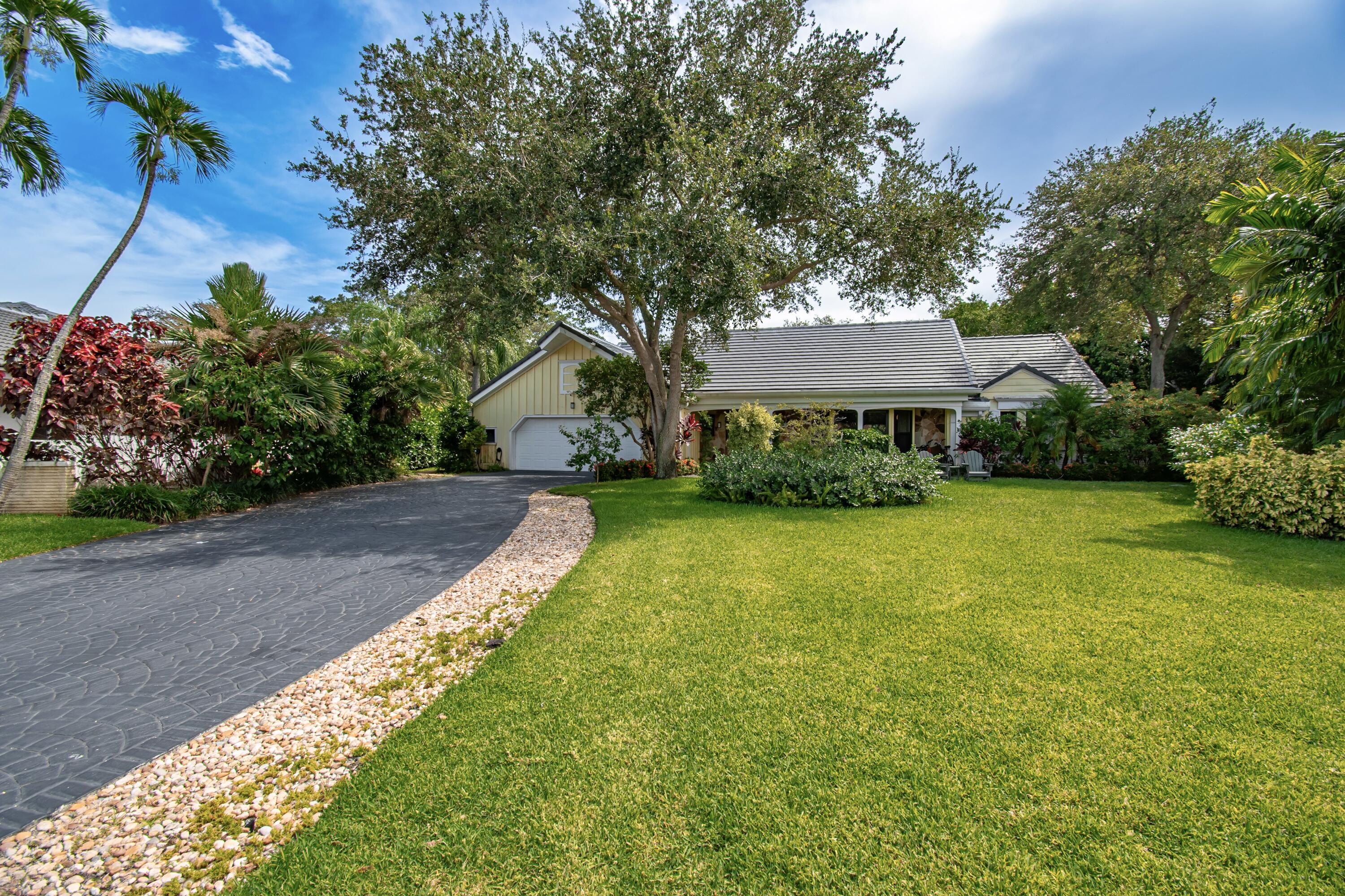 Welcome to this beautifully renovated 5BR/3.5BA home plus   private office/nursery on magnificent  1/2 acre  cul-de-sac lot. This exceptional residence features a desirable three-way split floor plan, a gourmet island kitchen,coffee bar, gas stove top & an inviting family room with fireplace. Upgrades include luxury vinyl flooring, smooth ceilings, LED lighting, impact windows & sliders, a brand-new roof. The spacious primary suite overlooks the tropical backyard and offers a spa-like bath with dual vanities & an oversized double shower. Enjoy a lushly landscaped yard ,saltwater pool, new equipment, & Heated under an oversized screened patio. Walk to houses of worship. Located in A-rated school district with low HOA fees. Community amenities including tennis, basketball, playground Hurry! This is what you have been waiting for! Call today to schedule your confidential showing