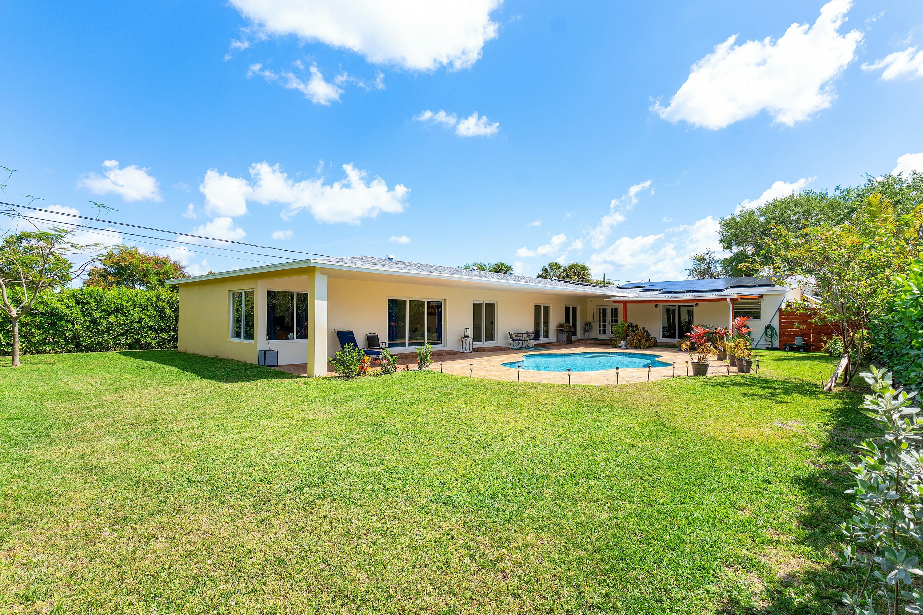 This spacious 5000+ SF compound offers endless possibilities, just steps from Pineapple Grove and downtown Delray. With its versatile layout and prime location this property presents a great investment opportunity, ideal for an assisted living facility or a short-term rental. The property consists of 5 bedrooms and 5 bathrooms. The original 1960s home, a 1336 SF residence with 2 bedrooms and 2 bathrooms, seamlessly connects to a 3000+ SF addition completed in 2024. This expansion includes a 2 car garage, 3 bedrooms and 3 bathrooms. The entire property surrounds a newly built pool, creating a functional indoor/outdoor living space. This property sits on a large lot with a room for further development. The existing layout allows you to double the number of bedrooms, maximizing its potential