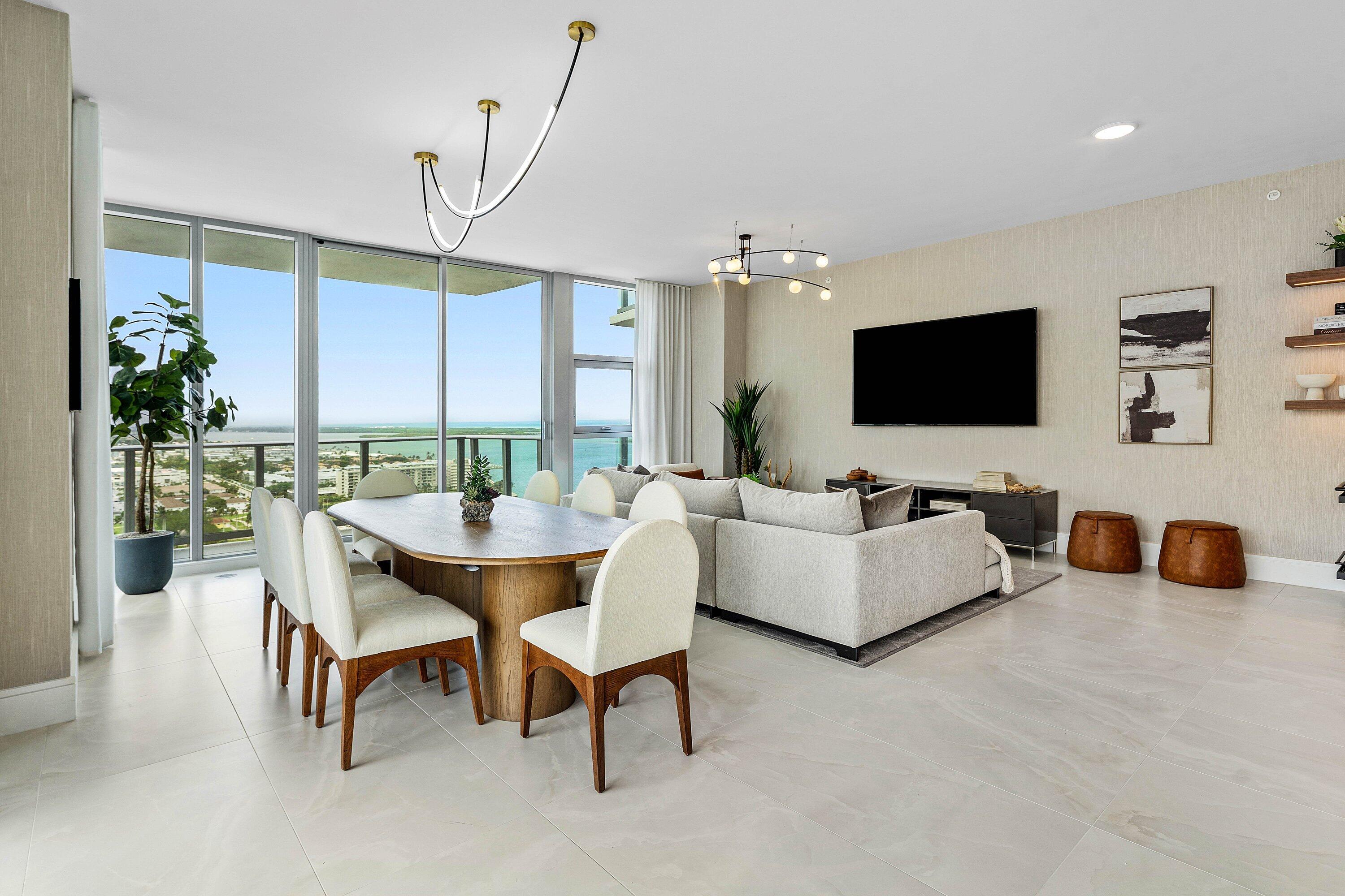 Skip the process of hiring a professional decorator and move right in to this Brand New Furnished 3 BR 3.5 Bath Corner Unit with a Stunning Turnkey Design package by renowned Steven G Interiors. Every detail has been completed in this Highly coveted C line unit on the 21st floor of the North Tower at Nautilus 220. Breathtaking sunrise and sunset east & west exposures capture Intracoastal, Atlantic Ocean, Sunrise, and Sunset views from almost 1,000 sq ft of additional outdoor living space. Interior features include 10' ceilings, hurricane-impact glass, an open kitchen with Miele appliances, wine cooler, and Primary suite with spa-style bath and oversized terrace. Enjoy true resort-style living with one of the most amenity rich buildings to hit South Florida in a long time with two pools,  two spas, fire pits, putting green, yoga deck, dog park, club room, theatre room, sport simulator, mini bowling, guest suites, valet, 24-hour concierge, plus a marina onsite and multiple restaurants by renowned chef David Burke.