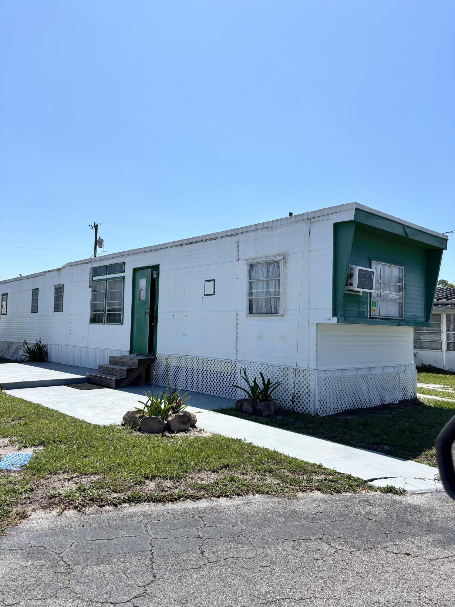 NO LAND LEASE! The home is being sold as-is and is ready for a complete remodel. With some vision and TLC, this could be transformed into a cozy seasonal retreat or affordable year-round residence. Features: 55+ Co-op ownership (land share included) Low monthly maintenance fee covering, trash, and lawn care Access to community amenities—clubhouse, pool, and shuffleboard Pet-friendly community (restrictions may apply) Convenient location close to shopping, dining, and beaches Perfect for investors, DIY renovators, or anyone looking to build equity in a desirable Florida community.