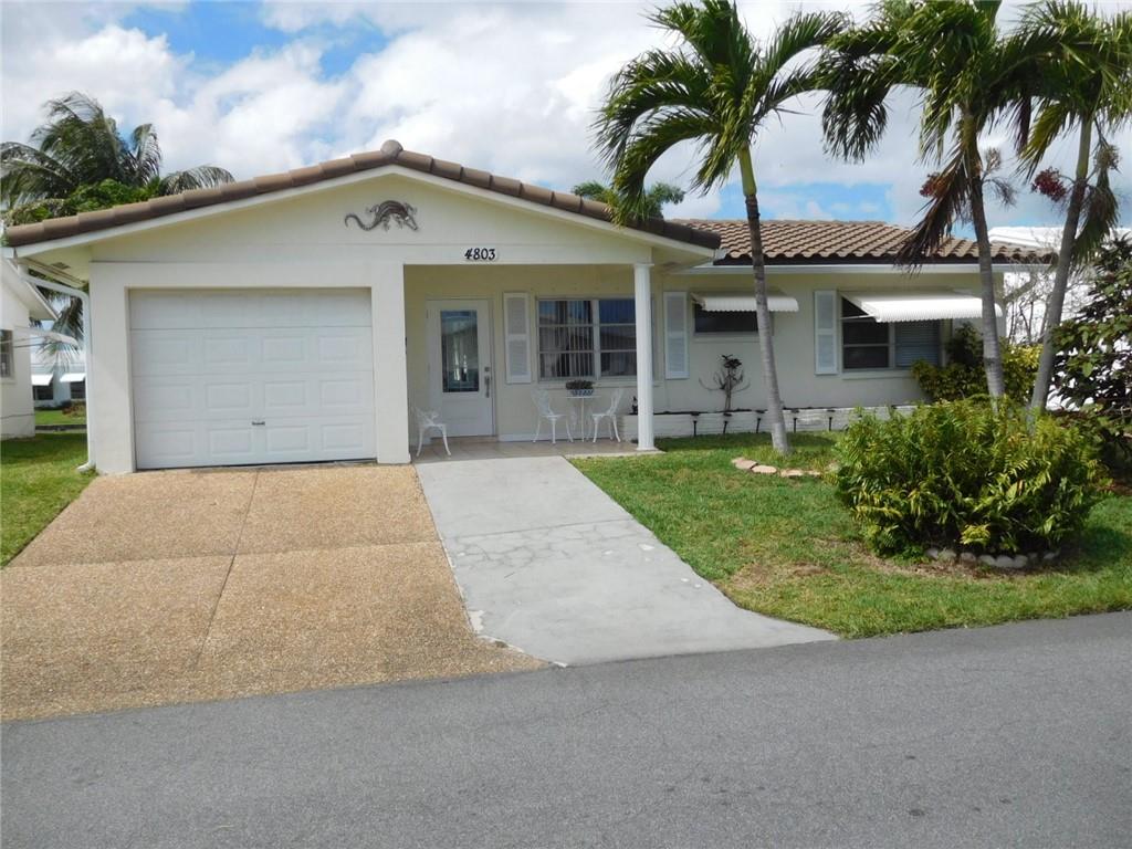 Exterior Patio and Huge Florida Room overlook peaceful water/Canal. 2/2 + Garage + Laundry Room. Ceramic thru out. Mrs. Clean lives here. New S-Tile New Roof 2019, A/C 2012, Garage Door & Front Door and its oval Window are Impact resistant. Awnings on all windows. Near Turnpike & I-95Maintenace fee of $85 includes Recreation Building with Socially Active Clubhouse, Pool, Automatic Sprinklers, Lawn Cutting.55+ community, 700 or more Credit score required. No rentals during first 2 years of ownership. VA approved HOA.