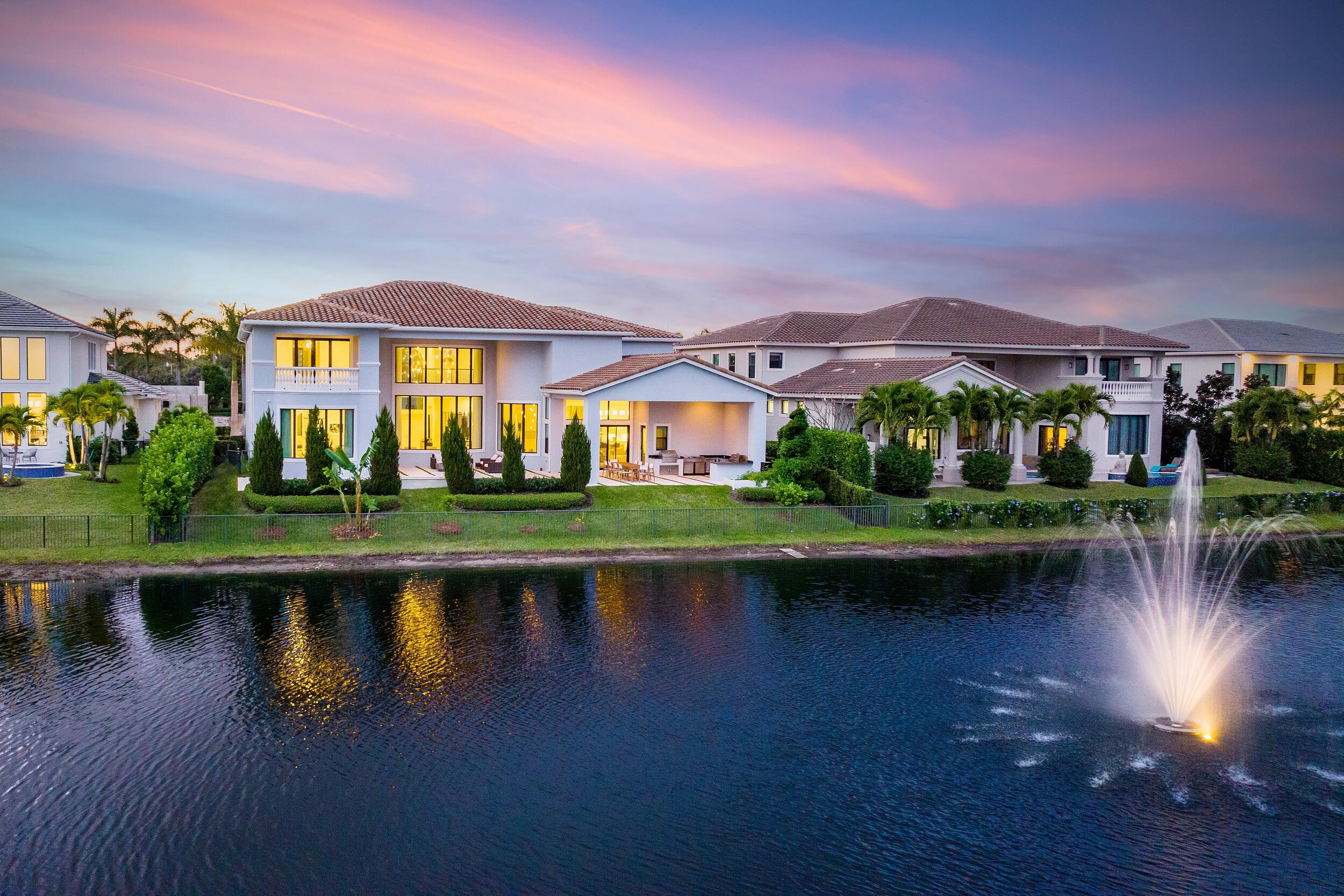 Situated on an ideal lakefront lot within the highly desirable community of Royal Palm Polo, Villa Sienna is an impressive two-story residence permeated with themes of clean lines, sophisticated design and radiating light. Each curated space is masterfully designed for luxurious living and gracious entertaining.
This custom residence boasts 7,200 living SF and features 5 spacious bedrooms, 7.2 bathrooms, great room, family room, formal dining room, gourmet kitchen, media room, gym and elevator. Thoughtfully built, the residence features two exquisite master bedrooms - one on each floor. An attractive entrance gives way to a spacious great room with soaring ceilings and dramatic windows that allows abundant natural light to flow through. Entering into the inviting family room, experience comfortable living with a breakfast area overlooking the outdoor lanai, lake and beautifully landscaped grounds. Through the sliding glass doors, enjoy your private outdoor space that features a full summer kitchen with grill, custom pool with spa, lush landscaping and garden area. Enjoy the tranquil sounds of the lake fountain which completes the setting of this perfect oasis - Experience Villa Sienna. 

The second floor includes the second master bedroom with bathroom, three guest suites with bathrooms and loft area which serves as a media room. 

Royal Palm Polo, an exclusive gated community situated centrally in Boca Raton, is in close proximity to top private and public schools, many different houses of worship, and South Florida's world-renowned beaches. Amenities included are a private, staffed Residents' Club, tennis courts, basketball court, resort-style swimming pool, and state-of-the-art fitness center.