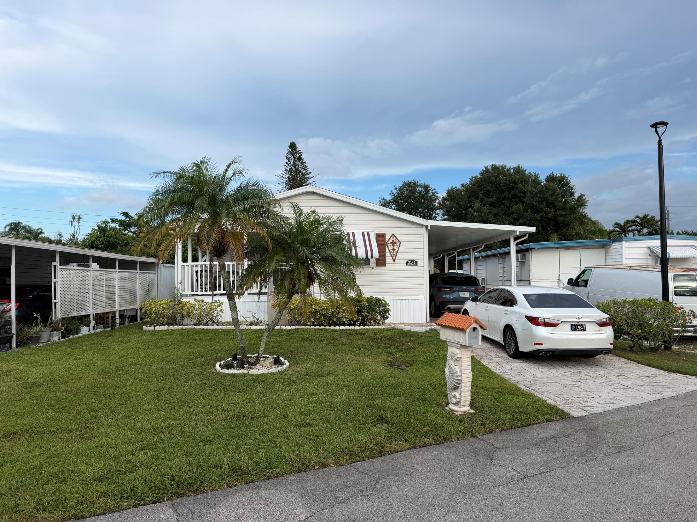 Beautiful 2/2 double wide built in 2006 with carport --shed - open porch - on oversized lot - huge back yard - -washer and dryer inside house - one of the larger homes available - assoc. states it is HOPA verified - priced right for quick sale - financing is available on this property - -truly a must see..........