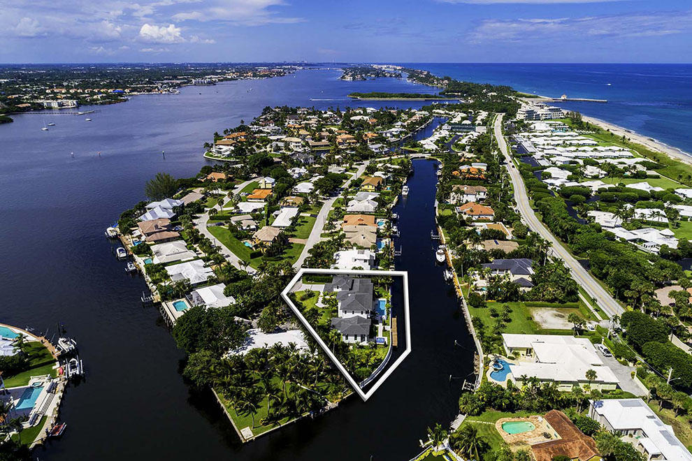 The brand-new waterfront estate located at 16 Sabal Island Drive in the coastal Town of Ocean Ridge offers an unmatched elegance by the sea. Situated on a quiet cul-de-sac, the expansive parcel boasts 226 feet of waterfrontage, manicured lawns and privacy. The custom-built home combines clean lines and modern sophistication to showcase picturesque water views. Offering 6,376 total square feet and six bedrooms, features include formal living and dining rooms, chef's kitchen, first-floor master wing with private loggia, second-floor VIP suite and guest studio above the three-car garage. The outdoor living areas, heated pool, overflow spa, summer kitchen and private dock are perfect for entertaining and relaxing with nearby ocean access for boaters. South Florida's luxury lifestyle awaits! Quality built by Stephen Varga Homes in conjunction with Palm Beach architect, Rafael A. Rodriguez, this waterfront masterpiece is exceptionally appointed and exquisitely decorated by Ava Gray Interiors. Superior finishes include volume ceilings, large rectified 36" x 36" porcelain tile downstairs, white oak wood floors upstairs, custom-designed and finished cabinetry, custom hardware throughout and impressive stairway with custom glass railings. From the oversized windows and sliders overlooking the waterway to the aluminum and glass garage doors and extraordinary glass front entryway, there are numerous vantage points to enjoy the gorgeous views of the grounds and flow-through waterway. An exceptional elevation further enhances the coastal breezes and endless water views. 

The Town of Ocean Ridge is nestled along the central coastline of Palm Beach County with its pristine beaches, oceanfront parks and its Town Hall and private police department. The waterfront residence is located on the south end of Sabal Island in the McCormick Mile neighborhood. Enjoy the pleasant drive along A1A to the boutique shops, restaurants and eateries in Delray Beach to the south and Palm Beach to the north. Jet-setting is effortless with three international airports and numerous private airports easily accessible via nearby Interstate 95. The Intracoastal Waterway provides endless opportunities for aquatic activities with the nearby inlet just minutes away for excursions on the Atlantic Ocean.

Situated on a .42 acre lot, the beautifully landscaped grounds, double pitched roof, decorative driveway and notable walkway combine to create a dramatic introduction to this timeless residence. The entryway provides the first glimpse of the interior's clean lines, volume ceilings and inspiring water views. The formal living room has a wall of sliders that open to the covered loggia, pool and waterfront grounds. The south wing is accessed via the main first-floor hallway just off the living room and features a powder room near the main stairway and a covered terrace that overlooks the front grounds. 

Located on the north wing of the house, the kitchen, family room and formal dining room are light and bright with lots of windows, sliders and a transitional floor plan that invites the outdoors in for maximizing waterfront living. The gourmet kitchen features top-of-the-line appliances, wine cooler, Caesar stone countertops, a large island with Cristalita quartzite countertop, a spacious, hidden walk-in pantry and easy access to the formal dining room. The family room has a casual elegance and is open to the kitchen with sliders to the covered loggia and summer kitchen. The laundry room, second powder room and three-car garage are conveniently located off the kitchen.

The spacious and opulent first-floor master wing was designed to invite private retreats with sliders to the private loggia and spa, a large walk-in closet with custom built-ins and a luxurious master bath with dual vanities and walk-in showers, a soaking tub and two water closets. Additionally, there are two en suite guest rooms with sliders opening to the waterfront terrace and pool.

The contemporary and dramatic stairway with all glass railings provides an impressive alcove for displaying a prized piece of art or baby grand piano. The second-floor offers a loft at the top of the landing, a VIP suite with balcony access and an additional en suite guest bedroom with balcony access. There is a private guest studio located above the three-car garage with a dedicated stairway off the kitchen. The quarters are complete with a kitchenette, closet and full bath making it a private space for guests or staff.

Perfectly located at the south end of Sabal Island on a quiet cul-de-sac, this impressive estate has been expertly designed to maximize the 226 feet of waterfrontage and open, green spaces. The covered loggias and balconies provide space for outdoor living and dining while the open terrace and walking paths perfectly frame the heated pool with sun shelf and the separate champagne overflow spa. The private dock and flow-through waterway offer the perfect setting for recreational boaters and serious yachtsmen alike with ocean access just minutes away. 

The house has an impressive elevation thanks to the natural coral-formed island location. The impact glass windows and doors have anodized aluminum frames that accent the home's modern flair and provide worry-free living. The home is pre-wired for security, audio-visual and Smart home technology. Other top amenities include three-zone air-conditioning system with infusers; central vacuum; concrete tile roof and zoned sprinkler system.

McCormick Mile residents are invited to join a voluntary Homeowner's Association which includes access to the private beach house overlooking the ocean perfect for entertaining complete with kitchen, tables and chairs, showers and bathrooms.

Much like a work of art, this waterfront estate is a one-of-a-kind masterpiece that represents the very best Ocean Ridge has to offer. Boasting six bedrooms, 5,118 living square footage and 6,376 total square feet, this impressive property proudly takes its place in the luxury real estate market.