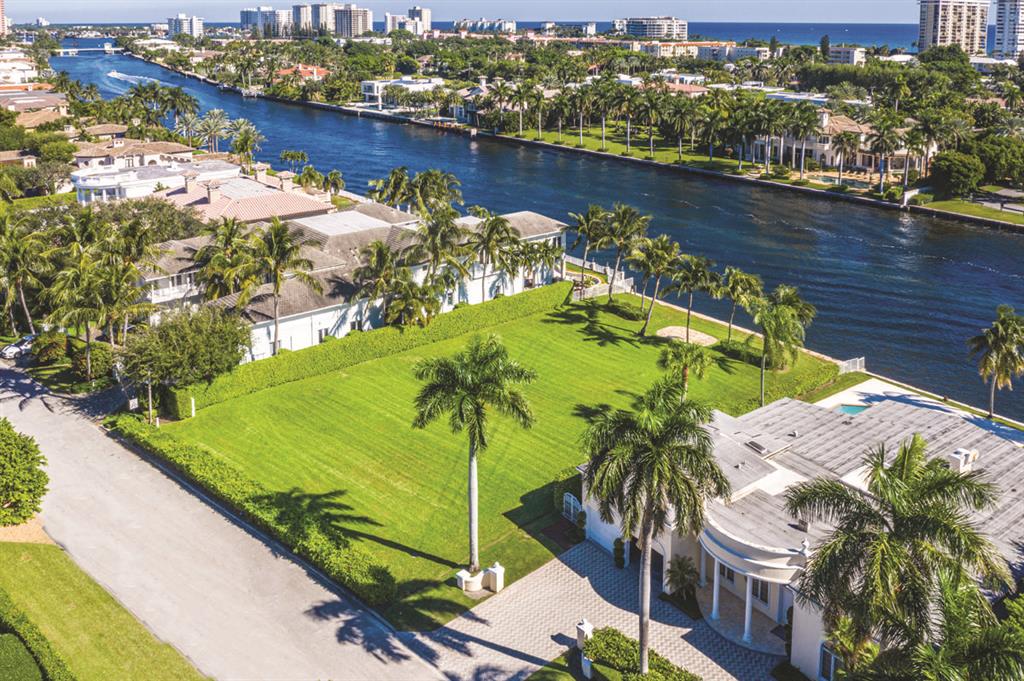 Last remaining undeveloped Intracoastal lot available in Royal Palm Yacht & Country Club! Great opportunity to build your dream home!