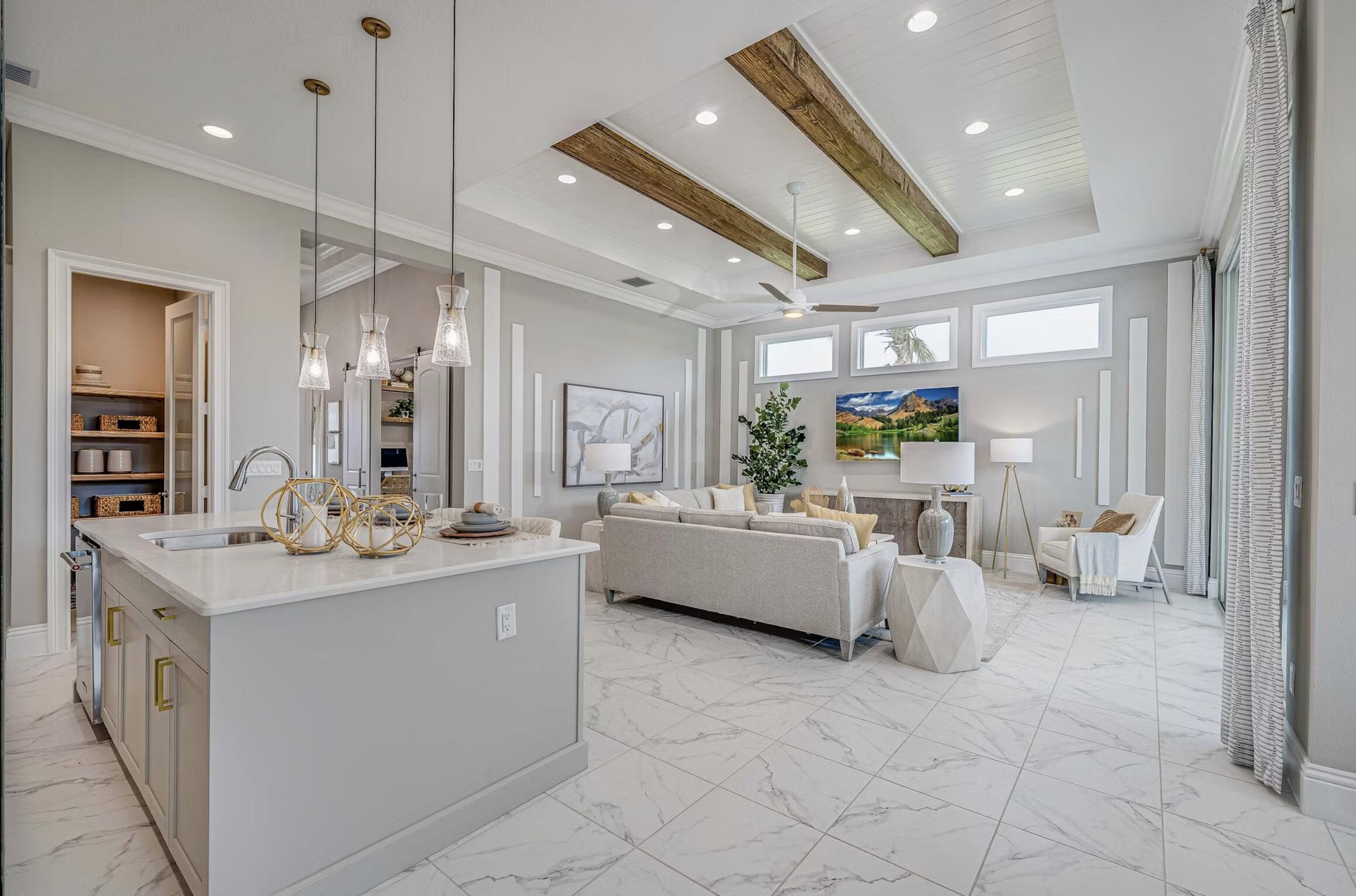 Located on an oversized lakefront site with long golf views, this pre-construction home awaits you. The Cecelia-Basile plan features 4 bedrooms & 2.5 bathrooms. The family room, kitchen, & dining area feel open & airy, with 12-foot-high ceilings, large windows, & 10-foot-high sliding doors. The kitchen features easy-close cabinets with dovetailed drawers, a natural gas cooktop, a wall oven, and a fridge. The quartz-topped island is large enough to accommodate 4-5 bar stools. The Greatroom features crown molding, a tray accent ceiling, and three transom windows. The primary suite features crown molding, a tray ceiling, large windows, an expansive walk-in closet, plus in the bathroom, double vanities, a soaking tub, and a walk-in glass shower. Call today to make your selections or upgrades.