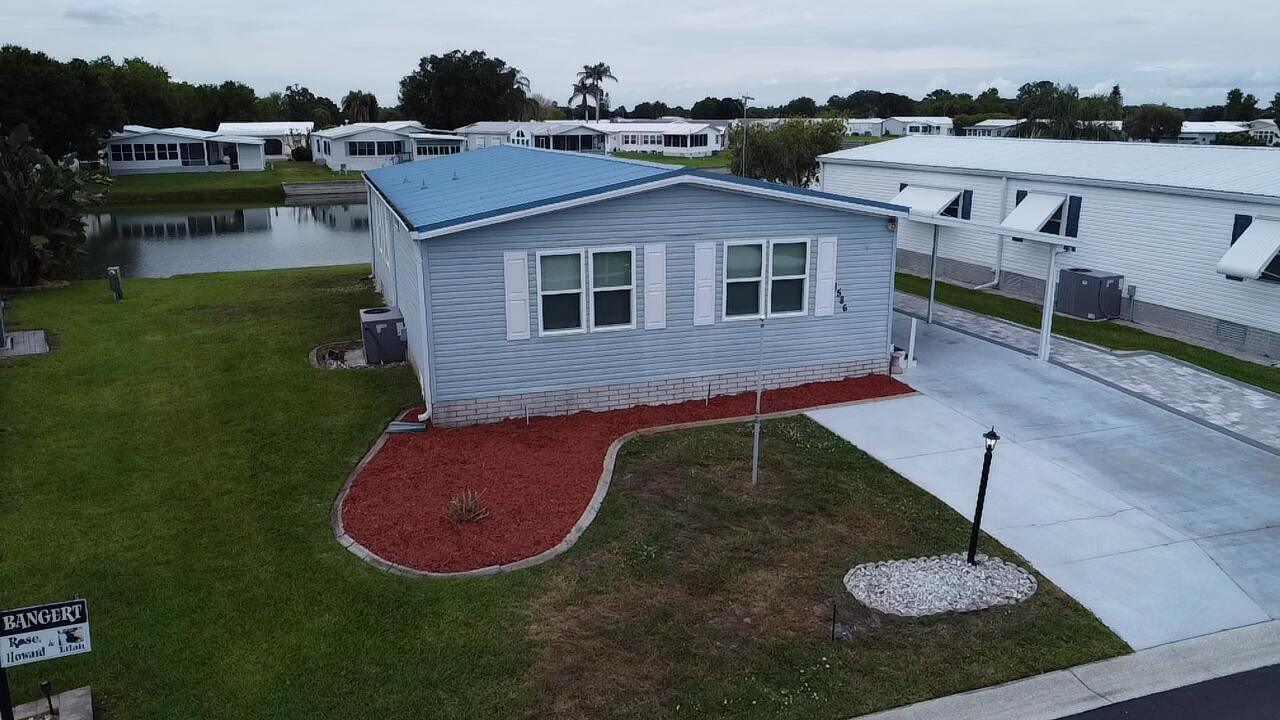 Water Front Retreat! Enjoy waterfront living in this sought-after 55+ community in Seminole Cove. This well-maintained 2-bedroom, 2-bath home offers a metal roof, oversized living area, and serene water views. Spacious layout with plenty of natural light, ideal for comfortable year-round living or seasonal retreat.