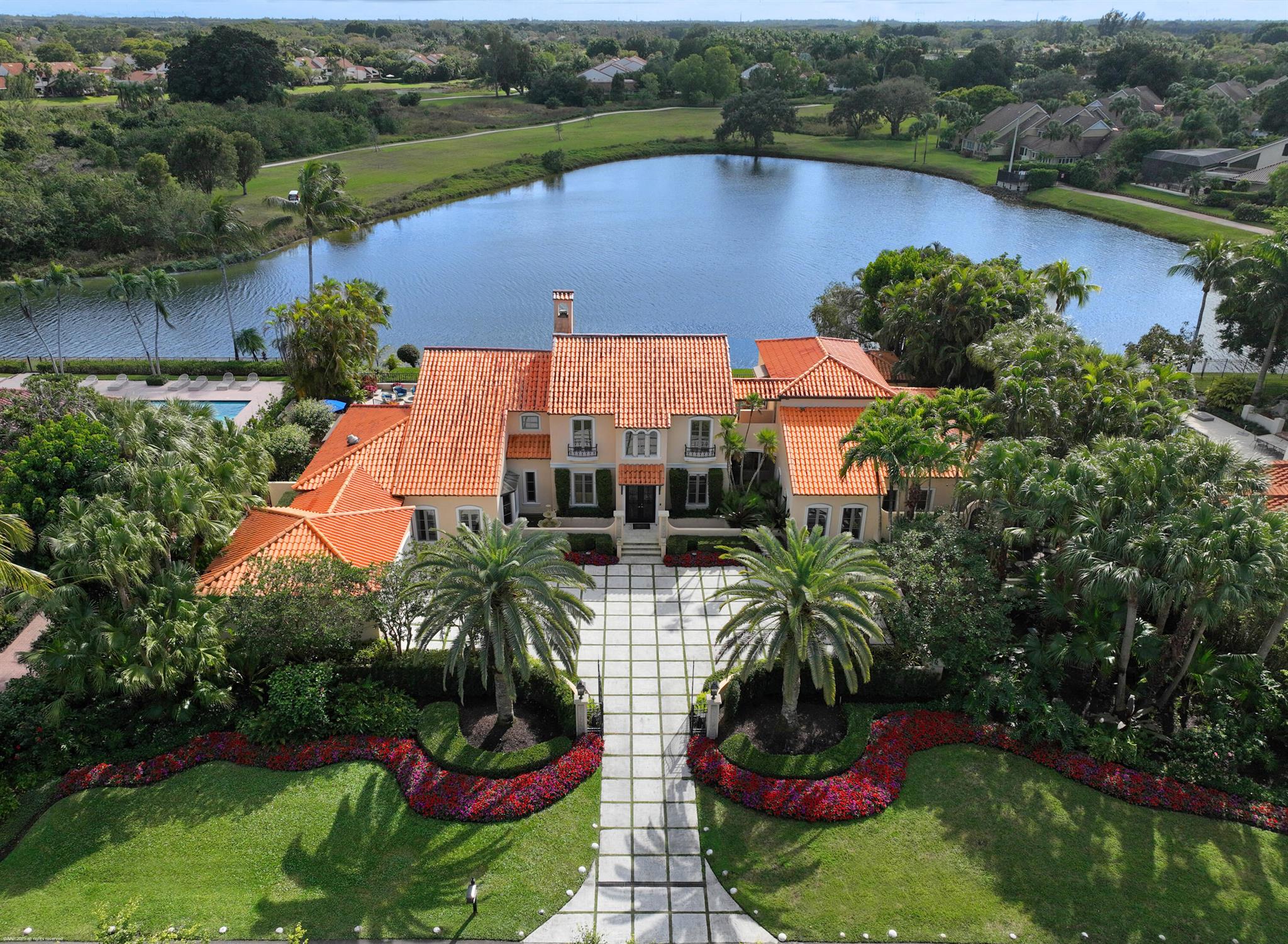 One of the best view in all of Palm Beach Polo. Palm Beach Polo. Located in sought after Maidstone Estates, this elegant 4-bedroom, 5 1/2-bath Mizner-inspired Mediterranean estate offers 6,000 square feet of refined living space. Designed for both comfort and sophistication, with spacious living areas both inside and out. Enjoy breathtaking long water views from the expansive lap pool, which overlooks a serene preserve. The private outdoor patio is an entertainer's dream, featuring a covered grill and bar area with a full cabana bath, as well as a firepit and outdoor entertainment bar, all with sweeping views of both the water and preserve. A separate guest suite with a private entrance provides ultimate privacy, while the home is equipped with impact glass for added security. This estate offers an elegant blend of style, comfort, and privacy.
Buyer pays one time transfer fee of $5,500 to POA.