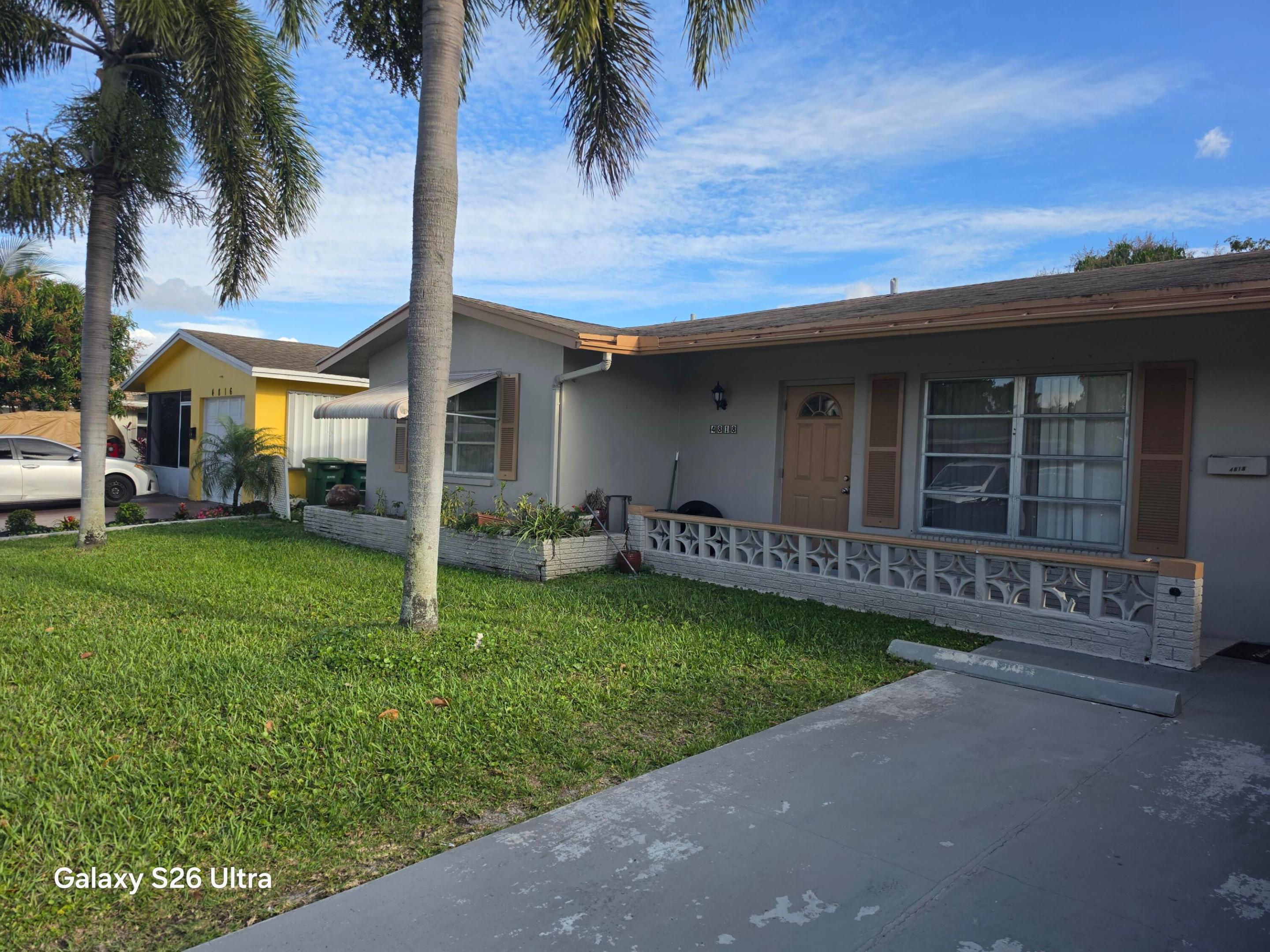 Beautiful 2/2 in Tamarac. Step inside to find an inviting open floor plan that seamlessly connects the living, dining, and kitchen areas. Open kitchen feature a breakfast bar for casual dining, ample cabinetry, making it a perfect spot for both cooking and gathering. Spacious rooms and closets with oversize bathrooms. Enjoy a large Florida room with view of the lake perfect for an office or place for kids to play. This home comes with full size washer and dryer. Large front and back porch with redone storage shed. This home has serene lake view, perfect place for relaxation nestled in a friendly community. You'll enjoy easy access to shopping, dining, entertainment, and top-rated schools. Low HOA fee. Refrigerator, stove, water heater like new. Beautiful 2/2 in Tamarac Mainlands