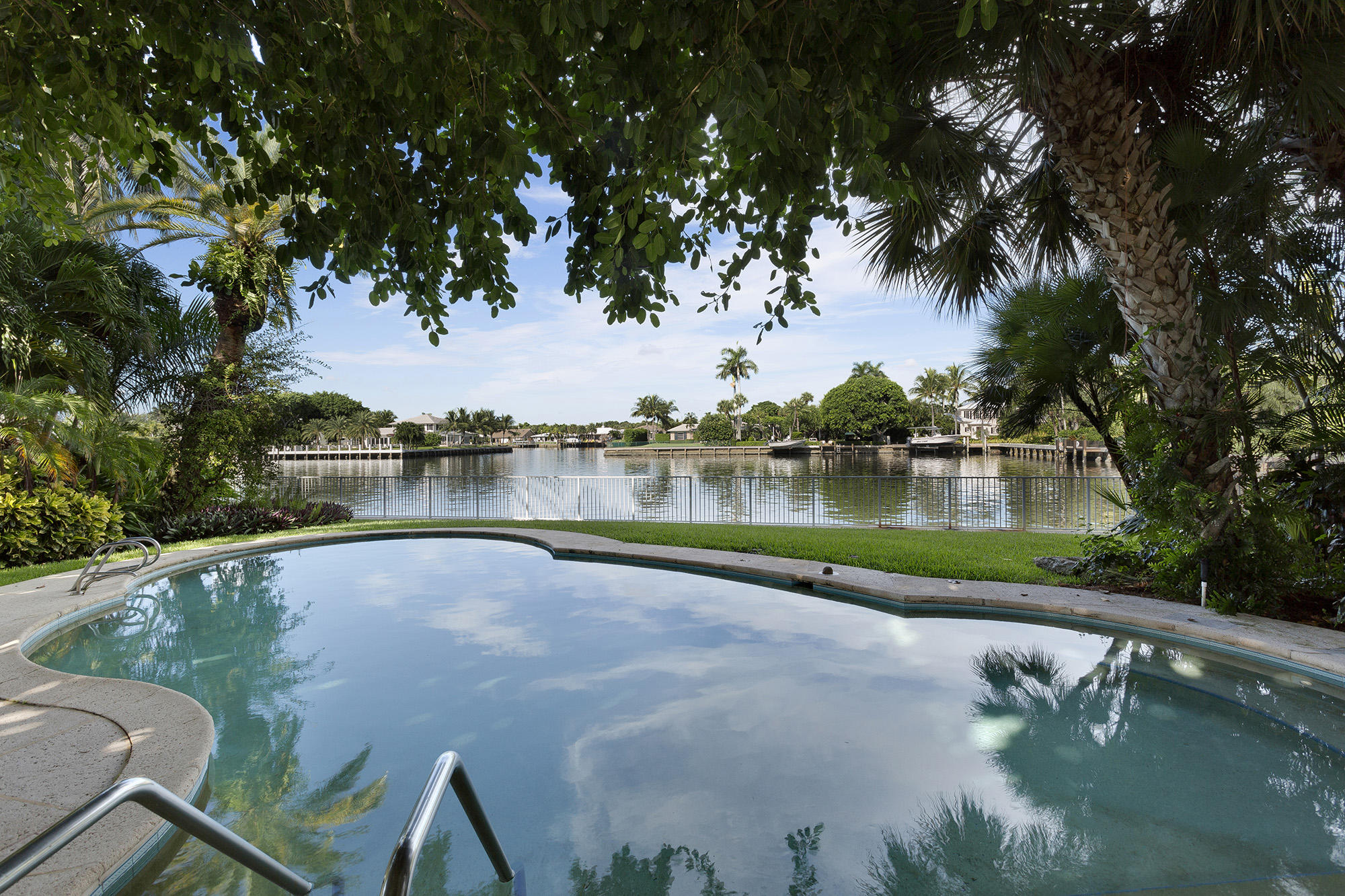 HOOKED UP TO PRIVATE SEWER SYSTEM; ***SEE SUPPLEMENT FOR ADDITIONAL DETAILS*** Fronting 155Â± feet on tranquil Polo Cove, this classic estate captures picturesque westerly views over the water to the Intracoastal Waterway just beyond.  The shoreline is equipped with protected dockage.  Shaded by majestic banyan trees, the lush and spacious .56Â±-acre grounds feature a beautiful pool terrace that captures far and wide water views from right by the shore.  The property is served by a double-entrance drive that sweeps to the residence and winds around to the two-bay garage with side entrance.

DISCLAIMER: The written and verbal information provided including but not limited to prices, measurements, square footages, lot sizes, calculations and statistics have been obtained and conveyed from third parties such as the applicable Multiple Listing Service, public records as well as other sources. All information including that produced by the Sellers or Listing Company are subject to errors, omissions or changes without notice and should be independently verified by any prospect for the purchase of a Property.  The Sellers and Listing Company expressly disclaim any warranty or representation regarding all information.  Prospective purchasers' use of this or any written and verbal information is acknowledgement of this disclaimer and that Prospects shall perform their own due diligence.  Prospective purchasers shall not rely on any written or verbal information provided when entering into a contract for sale and purchase.  Some affiliations may not be applicable to certain geographic areas. If your property is currently listed, please do not consider this a solicitation.   In the event a Buyer defaults, no commission will be paid to either Broker on the Deposits retained by the Seller. "No Commissions Paid until Title Passes."    Buyer pays title insurance, Florida documentary stamps, and all other closing costs for New Construction and land use. Copyright 2016 Listing Company.  All Rights Reserved.