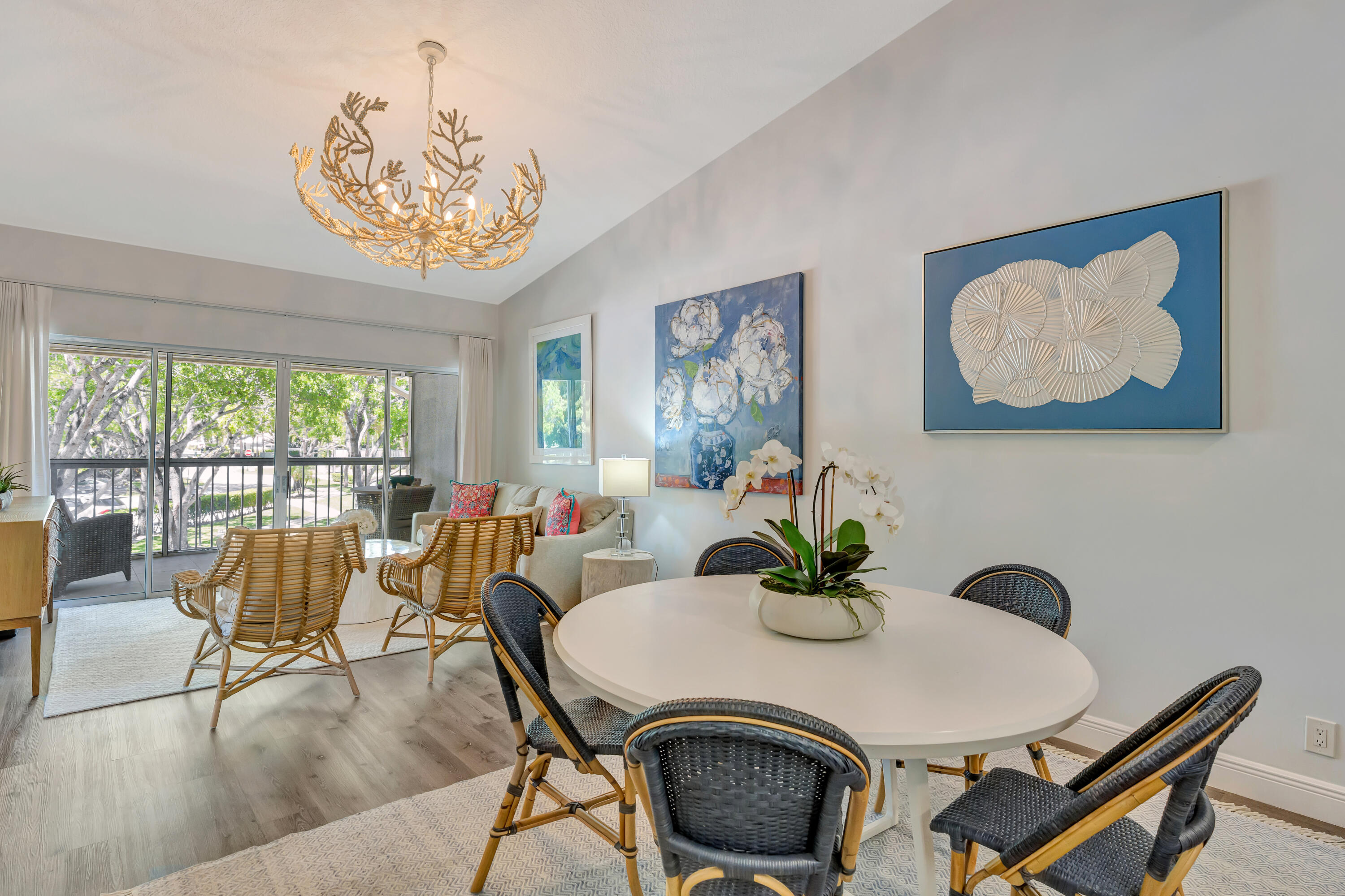 Introducing 229 Cypress Point, a beautifully decorated and turnkey 2-bedroom, 2-bath condo located in the highly desirable PGA National Resort community. This bright residence features an open floor plan, a fully renovated kitchen, ceramic flooring throughout, and elegant Serena & Lily furnishings.  The property includes a private screened-in porch and is conveniently located just steps from the community pool. As a resident, you will enjoy the security of a guarded gatehouse and access with membership to premier resort-style amenities, including fine dining, a spa, fitness center, tennis, pickleball, and scenic walking paths. This residence is move-in ready, and all furnishings are included in the sale, with the exception of two specific pieces of artwork excluded by the seller. Updated and beautifully. Electric window treatments throughout the condo with the exception of the second bedroom and close proximity to Turnpike and to shopping and dinning