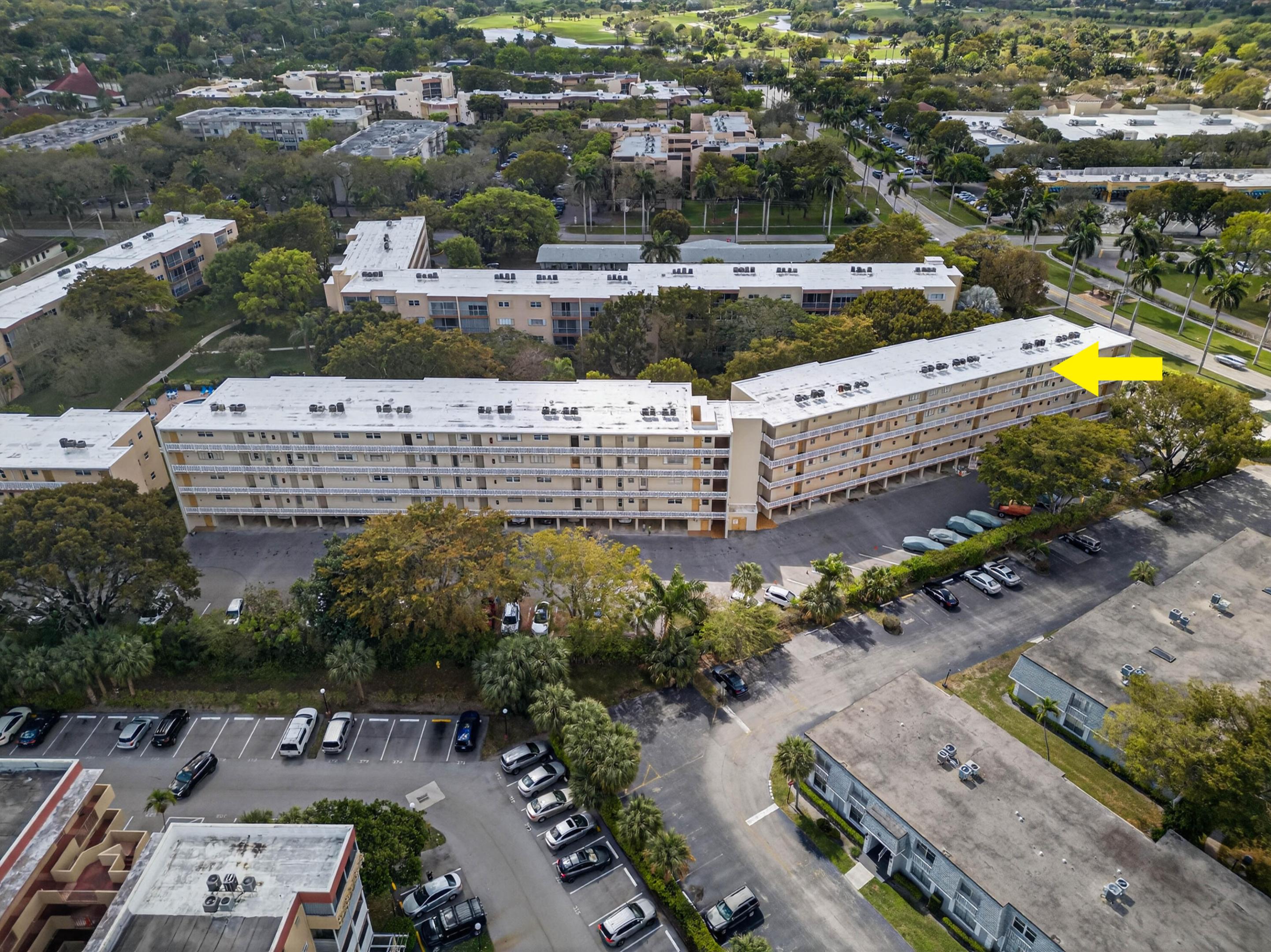 One of the town's most spacious one-bedroom units! Located in a meticulously maintained complex, this home is just a short walk to Publix, restaurants, Starbucks, UPS, the bank, and more—your own private shopping and dining district. No need to venture far unless you want to! A convenient half bath sits off the foyer entry. The oversized bedroom features two generous closets. Relax on the tiled, screened balcony with Rolladen shutters overlooking peaceful greenery. Enjoy coffee at sunrise or wine at sunset in this quiet retreat. NEW ELECTRICAL PANEL & WATER HEATER, Impact Windows, NEW ROOF and building FRESHLY PAINTED. 55+ community. Only this building w/in the community permits a pet, with a maximum weight of 20 lbs. See broker remarks for requirements.