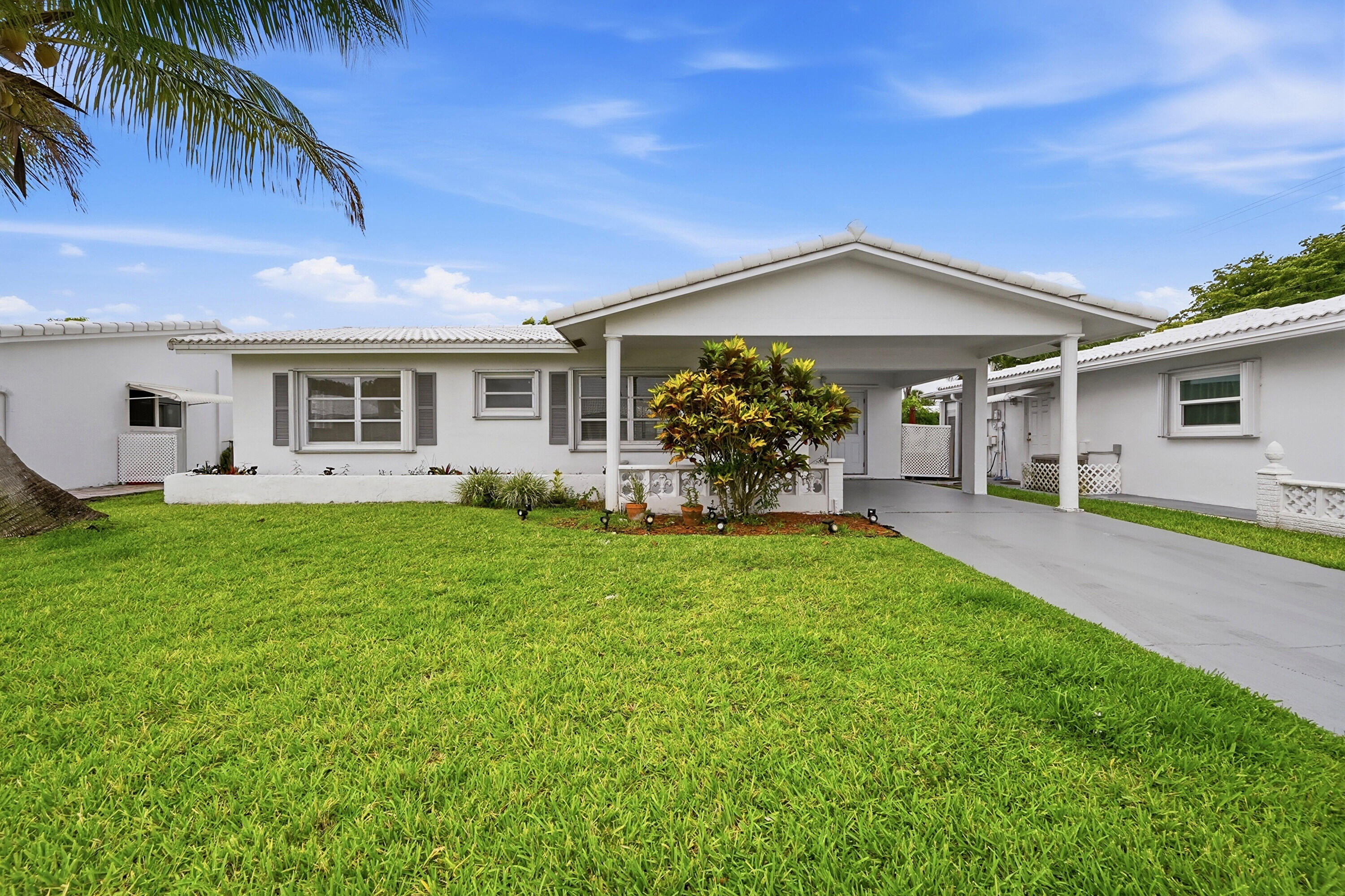 Welcome to this charming single-story residence nestled in the Mainlands of Tamarac Lakes community in Tamarac, Florida a 55+ age restricted community. This well-proportioned home offers 1,342 square feet of finished living space with two bedrooms and two full bathrooms, providing comfortable accommodations for various living arrangements. The single-floor layout ensures convenient, accessible living without stairs, making everyday movement effortless throughout the residence. Located within an established community setting, this property presents a practical option for those seeking a compact, functional home in the Tamarac area.
