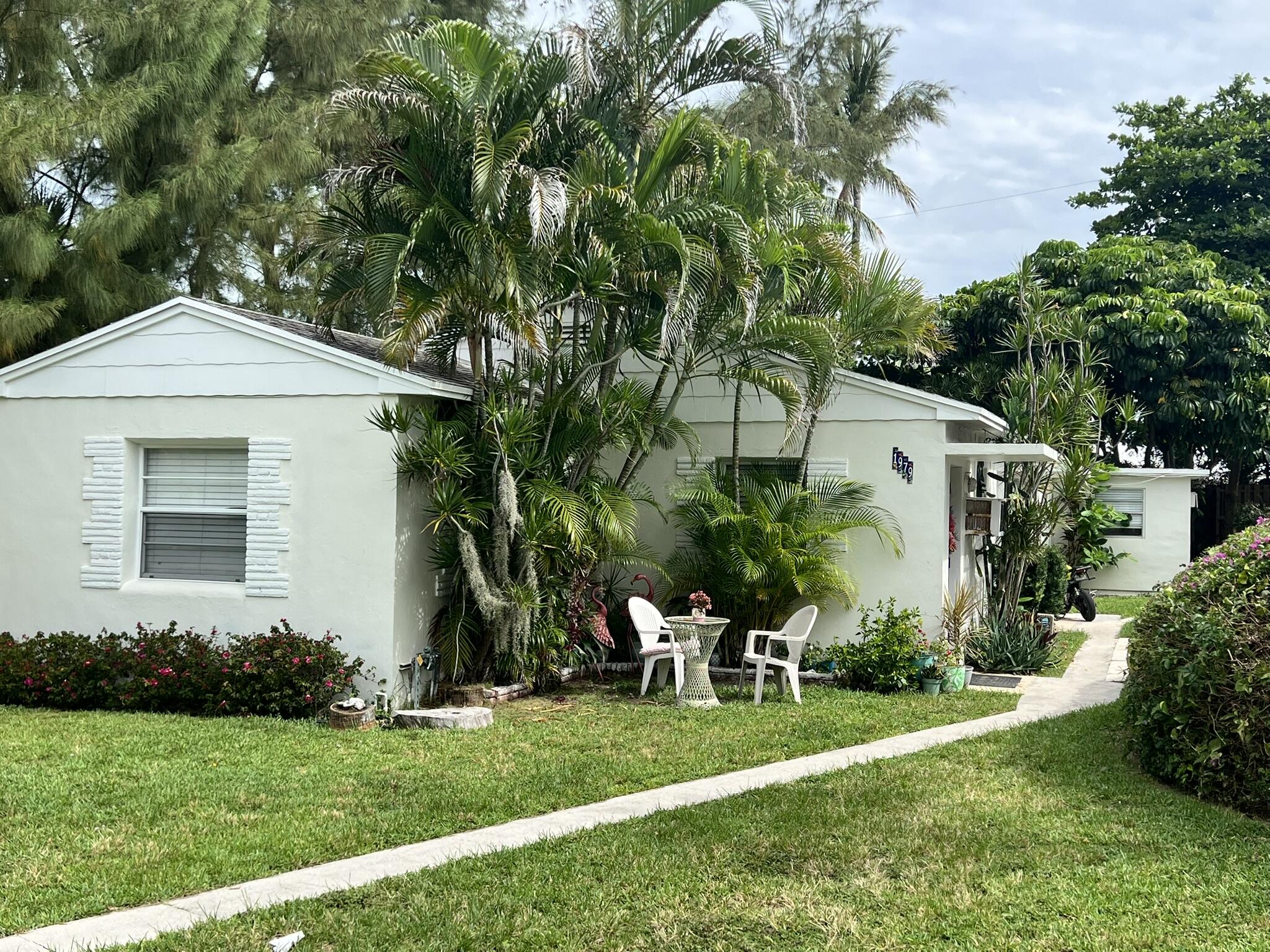 INVESTOR OPPORTUNITY JUST ONE BLOCK FROM THE BEACH! Rare chance to own a fully occupied quadplex in one of South Florida's most desirable coastal locations, situated on the Palm Beach County line between Deerfield Beach and Boca Raton. Located just north of the iconic Deerfield Beach Pier and steps from the sand, this income-producing property offers immediate cash flow with strong upside potential. The property consists of four fully leased units with new annual leases in place. Units 1 and 4 are one-bedroom residences currently rented at $1,600 per month, while Units 2 and 3 are efficiencies rented at $1,400 per month. With all four units occupied, investors can enjoy stable rental income from day one. Beyond its current income stream, this property has amazing redevelopment potential.