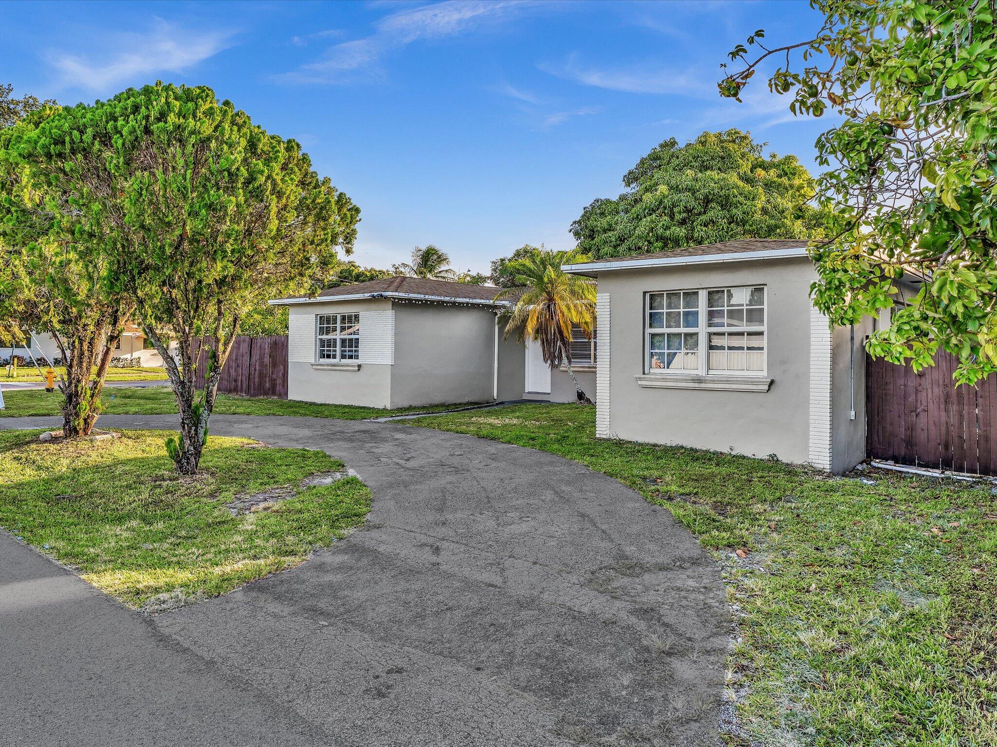 Welcome to this bright and welcoming 3-bedroom, 2-bathroom single-family home situated in an incredible, highly sought-after location! Boasting an ideal split floor plan bathed in abundant natural light, this home offers both privacy and a spacious feel. Enjoy the ultimate freedom of homeownership with NO HOA restrictions. The private backyard features a beautiful, mature mango tree, perfect for South Florida outdoor living. Unbeatable location just minutes from the Gulfstream Park dining and entertainment district, I-95 for easy commuting, local parks, and pristine beaches. Don't miss this fantastic opportunity!