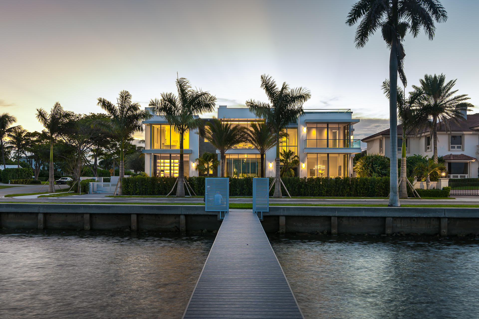 UNPARALLELED DESIGN
UNMATCHED CONSTRUCTION

6717 S Flagler Dr is one of the most distinctive properties ever built in Palm Beach County.  Designed by developer Steve Bendat of the Aquantis Group and architect David Lawrence, 6717 S. Flagler Dr is an estate compound that maximizes the tropical nature of South Florida and the spectacular views of the Intracoastal waterway and the ocean beyond.

Facing the estates on Billionaire's Row, 6717 S Flagler Drive offers an unobstructed eastern view of the island of Palm Beach.   Sunrises are spectacular.  Sunsets are even better.  As the sun goes down, it casts an amazing glow across the entire island.  Nights are magical as the moon rises and reflects on the Intracoastal. Luxury Resort Living Without Compromise
This 13,887 square foot three-story compound is an architectural masterpiece.  Inside there's a cantilevered glass and stainless-steel staircase overlooking the Intracoastal to the east and a backlit glass elevator to the west which both transport you to the 2nd floor.  Featuring six bedrooms, ten bathrooms, and two powder rooms. The house also has a private one bedroom guest house, a home office, and a four-car garage (upgradeable up to eight cars).

6717 S. Flagler Dr will be your own private resort.  Have a morning massage off the Master Loggia.  Float in the first-floor solar-heated pool or relax in the spa.  There's a private indoor gym and home theater too.   

Rain or shine, cook and dine outside around the main summer kitchen with a retractable roof.  Take a siesta and watch TV, read or just nap on one of the two covered loggias.  In the evening, have cocktails around the 3rd floor rooftop lounge with its own outdoor kitchen, bar, and heated glass spa floating over the Intracoastal.  There's never been a better time to stay at home.  

The gourmet kitchen features top of the line Wolf and Sub-Zero appliances, beverage centers, espresso makers and more.  And for a change of scenery, just cross the street to your gated deep-water dock, hop on your boat and take a cruise up the Intracoastal.

Construction
Hurricanes are no match for this new home constructed to last generations. Built with extra-large footers, reinforced steel, poured concrete floors and roofs, as well as concrete-filled block, the structure is virtually indestructible and soundproof.  

You won't hear a thing downstairs because of the concrete flooring, sound blocking, and double-paned ES 12-foot tall Impact windows and doors.  The high traffic extra hard porcelain floors all have soundproofed anti-crack sheeting underneath All the interior walls are insulated and have anti-mold drywall throughout.


Technology
The house has 600 amps of electrical service tied to a solar panel array (33KW) connected to a net zero meter.  If you want to store solar power to be used at night, just add compatible storage batteries.  The home is also pre-wired with fiber optic cables capable of transmitting 8K video to every room and patio. There's also a whole house 70Kw generator ready in case of emergency.

The house has a commercial-ready Savant control system that can manage AV, Lutron lighting and shades, temperature, security, home theater, fireplaces, cameras, an advanced security system and more.  

6717 S. Flagler Dr. was designed with seamless indoor/outdoor entertainment in mind.  Over thirty hidden in-wall phantom speakers and subwoofers distribute music throughout the house.  The dedicated media room with a 4K projector, Dolby Atmos speakers, 110" retractable screen, and home theater seating offers a theater-like experience.  Even the patios and roof-top lounge feature water resistant speakers and are ready for 8K video.

Design Details
6717 is modernism at its best.  The most simple and minimalist design choices define the house as a timeless classic.  No detail has been overlooked including: base and door surrounds with a Reglet system throughout; 10-foot solid core doors with Tactus hidden hinges; walnut and lacquer cabinetry; a 1,000-bottle glass wine cellar and six indoor and outdoor fireplaces.

No matter where you are inside or outside the simple, yet carefully planned landscaping reminds you that you are in the tropics.  From rooftop with intercoastal and ocean views to the lush living walls, from the west side of the house to the east side, there is either greenery or water surrounding you. 

6717 S Flagler.  Finally, a 21st Century house in Palm Beach County that merges modernism with unparalleled construction and design sophistication.


DISCLAIMER: The written and verbal information provided including but not limited to prices, measurements, square footages, lot sizes, calculations and statistics have been obtained and conveyed from third parties such as the applicable Multiple Listing Service, public records as well as other sources. All information including that produced by the Sellers or Listing Company are subject to errors, omissions or changes without notice and should be independently verified by any prospect for the purchase of a Property. The Sellers and Listing Company expressly disclaim any warranty or representation regarding all information. Prospective purchasers' use of this or any written and verbal information is acknowledgement of this disclaimer and that Prospects shall perform their own due diligence. Prospective purchasers shall not rely on any written or verbal information provided when entering a contract for sale and purchase. Some affiliations may not be applicable to certain geographic areas. If your property is currently listed, please do not consider this a solicitation. In the event a Buyer defaults, no commission will be paid to either Broker on the Deposits retained by the Seller. "No Commissions Paid until Title Passes." Copyright 2019 Listing Company. All Rights Reserved.