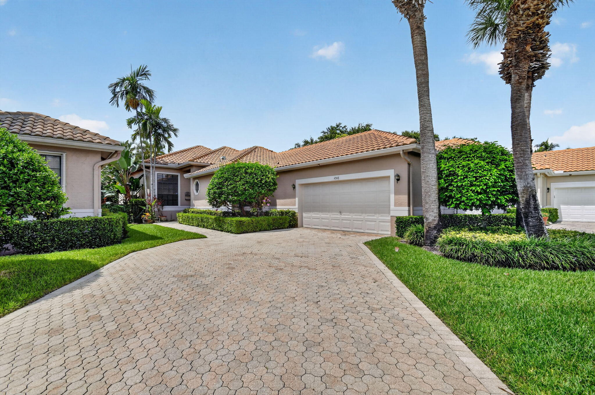 Welcome to this charming 3-bedroom, 2-bathroom single-story residence located in the Barclay Wycliffe Golf & Country Club. This well-proportioned home offers generous sized finished living space, providing comfortable room for everyday living and entertaining. The two-car garage ensures convenient vehicle storage and protection from the elements. Situated on a single story, this layout eliminates the need for stairs while maintaining efficient use of space. The three bedrooms and two full bathrooms accommodate various living arrangements and guest accommodations. This single-family residence in Wycliffe Golf & Country Club presents a practical opportunity for those seeking the best lifestyle offered in South Florida.  Wycliffe Golf & Country Club Is a Mandatory Membership Club Offering the Best Lifestyle in South Florida. Featuring Two Championship Golf Courses designed by award-winning architect Kipp Schulties. There Are14 Har-Tru Tennis Courts (5 new hydro-courts) with a Center Court Stadium Seating, Sports Court With 8  Pickle Ball Courts, 3 Dining Venues, State of the Art Fitness Center, Palates, Aerobics, Yoga, Spin, Fitness Classes, Water Aerobics, Personal Trainers, Physical Therapy, Sauna, Steam, Olympic Size Swimming Pool/Spa, Full-Service Spa, Ladies/Men's Card Rooms, Clubs and Organizations, Special Events, Dinner Dances.  Enjoy A Day of International Polo or Dressage/Jumping at the Wellington Equestrian Center, Just Minutes Away. Centrally Located with Ease of Access to Boca Raton, Del Rey Beach, Palm Beach, City Place and Airports. Comcast High Speed Internet, Telephone, Cable TV with Showtime & HBO, Voice Activated Remote and ADT Central Alarm Provided by the HOA