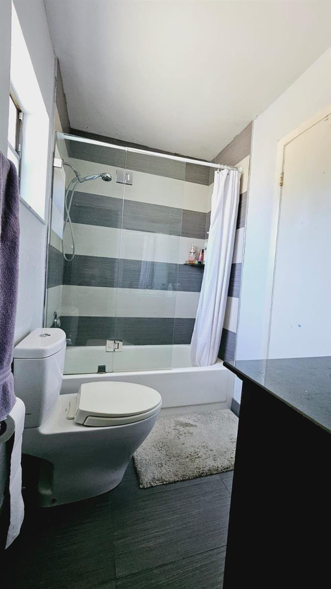 Spacious 2170sq ft 3 bedroom 2.5 bath townhome in Trellises. Quartz countertop kitchen. Primary bdrm w vaulted ceilings has huge walk in custom closet w a separate sitting/office area & private balcony overlooking a private garden, pool & clubhouse. 2nd bdrm has own ensuite bath & walk in closet. 3rd bedroom is downstairs. 2 AC units. Newer flat roof over screened in patio. New water heaters 2025. Centrally located near 595, near Broward Mall, Tower Shops, & Jacaranda golf course. Amenities include pool, clubhouse, gym, pickleball, tennis, basketball, sauna. Pets allowed. HOA covers water, exterior insurance including roof.