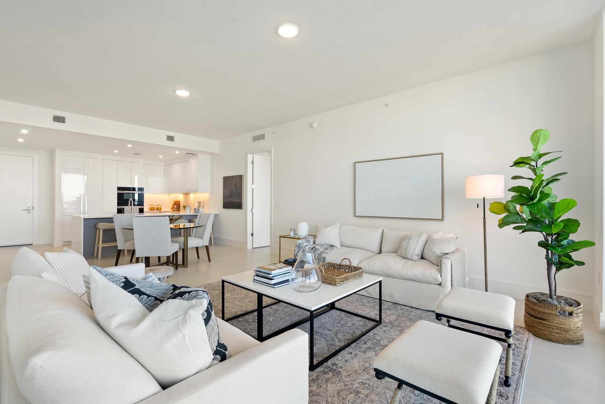This gorgeous new construction waterfront condo offers bright, easy living with stunning Intracoastal views. Flooded with natural light through floor-to-ceiling glass, the residence features high-end finishes, a clean modern design, and a layout that's perfect for enjoying South Florida's mild winters and relaxed coastal lifestyle. Inside, you'll find 10' ceilings, porcelain tile floors, a sleek kitchen with quartz waterfall countertops, premium Miele appliances, European cabinetry, and induction cooktop. Spa-like baths include a freestanding soaking tub, full-height tiled shower, and floating vanities, while smart-home-ready features make this a true lock-and-leave home.
The building's amenities rival those of a luxury resort, with multiple (rooftop) pools, cabanas, spa, fitness and wellness spaces, bowling alley, golf and sports simulator, movie theater, club and lounge areas, and even spaces for kids and teens. The building allows 2 pets and leasing once a year. Additional conveniences include valet service, garage parking, concierge, and on-site waterfront dining at SeaHawk Prime by David Burke. Walk out to the waterfront promenade or enjoy private beach club access on Singer Island. Perfectly located close to shopping, dining, and golf, just 10 minutes to the beach and about 20 minutes to downtown West Palm Beach and PBI. This is effortless waterfront living at its best.