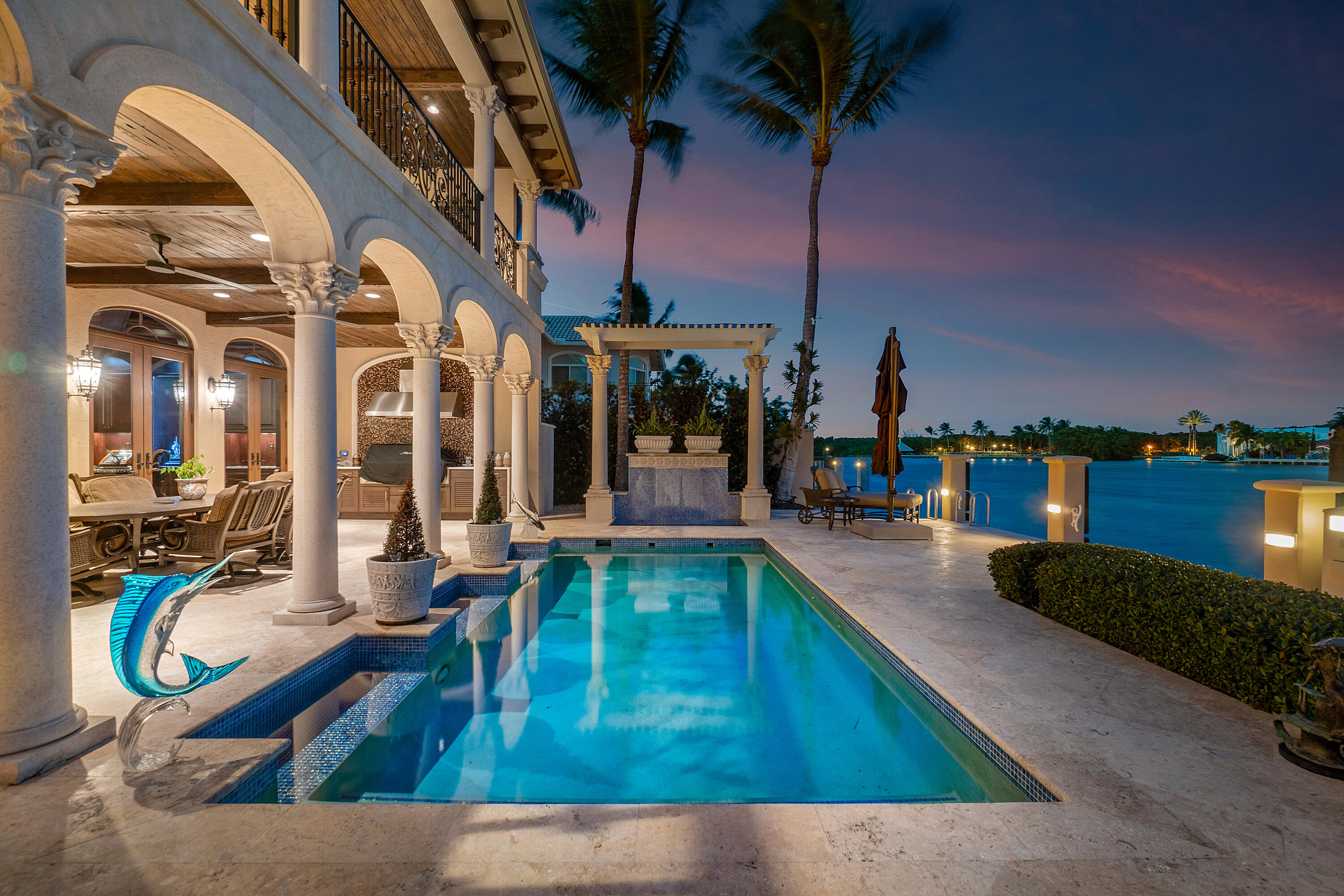 BOATERS PARADISE IN GOLDEN HARBOUR... This Mediterranean masterpiece is situated on one of the widest portions of the Intracoastal in a no wake zone and on one of the best deep water lots in Boca Raton with 85 feet of water-frontage and just minutes to the Boca Inlet & Ocean. This smart home was designed for family living and gracious entertaining. It features 5 spacious bedroom suites & 5.5 baths, elevator, a home theater, wine cellar, top of the line kitchen appliances, summer kitchen with new cabinetry & Alfresco gas grill, Whole House Generator, 3 Car Garage with AC a new roof in 2024 and extraordinary quality finishes and detail throughout. This spectacular home offers you an opportunity to own a piece of paradise in East Boca Raton. Its location is perfectly situated  - SEE SUPPLEME close to some of the finest restaurants and shopping in downtown Boca and the Town Center Mall. The Boca Raton