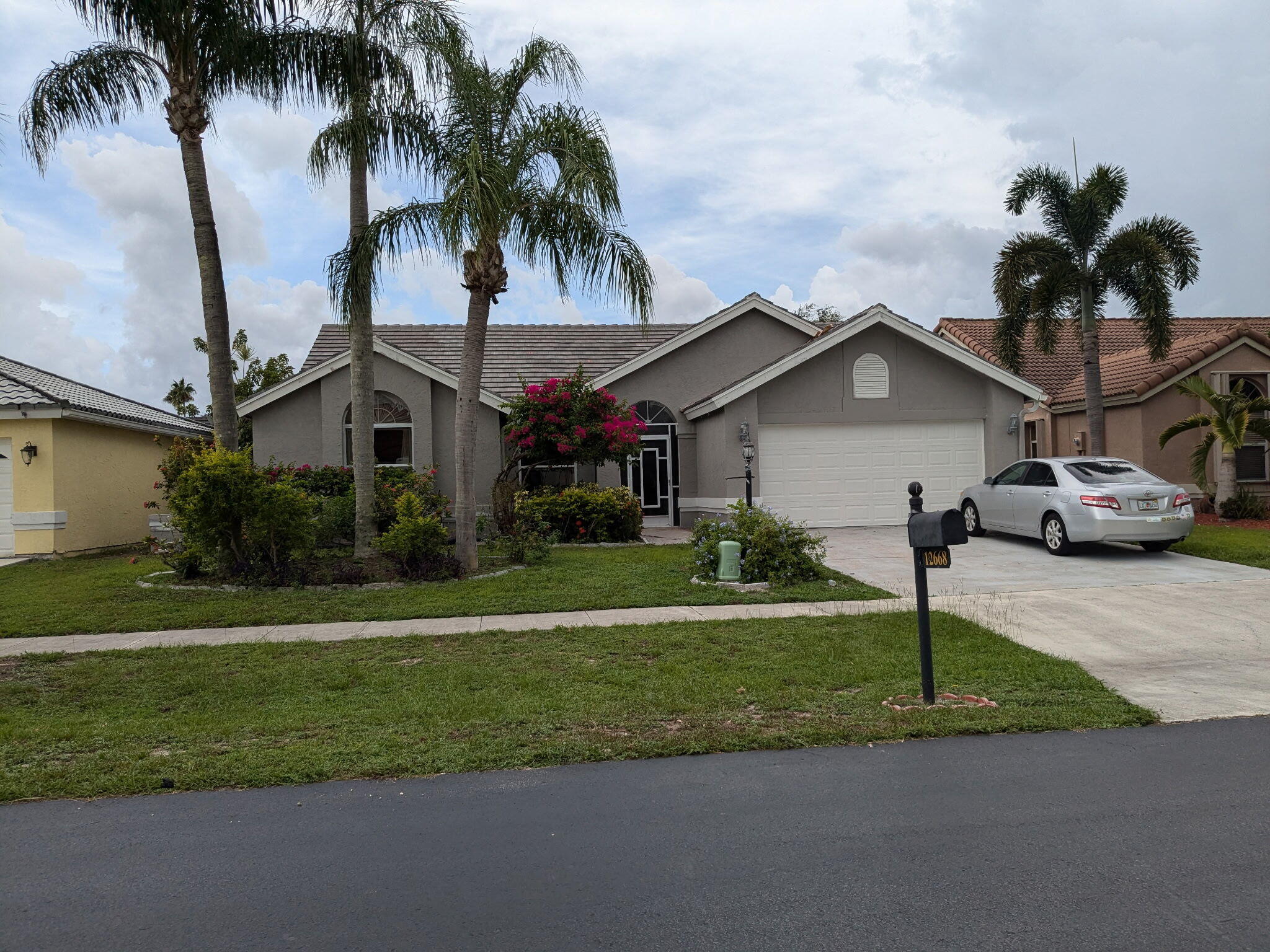 WELCOME HOME TO THIS BEAUTIFULLY MOVE-IN READY  3-BR/2-BA RESIDENCE, WHERE MAJOR UPGRADES HAVE ALREADY BEEN DONE FOR YOU.  A NEWER ROOF, GUTTERS, AC,FRESH EXTERIOR PAINT, AND A MIAMI-DADE CODE-COMPLIANT, HURRICANE RATED GARAGE DOOR AND SKYLIGHT OFFER LASTING PEACE OF MIND, ALONG WITH A FULLY RESTORED IRRIGATION PLUMBING SYSTEM.  INSIDE, A SPACIOUS EAT-IN-KITCHEN MAKES EVERYDAY LIVING EFFORTLESS.  STEP OUTSIDE TO THE SCREENED PATIO COMPLETE WITH A 220V HOOKUP READY FOR YOUR FUTURE HOT TUB, PERFECT FOR RELAXING OR ENTERTAINING IN TRUE FLORIDA STYLE.  ALL OF THIS IS NESTLED IN THE HIGHLY DESIRABLE WELLINGTON VILLAGE, CELEBRATED FOR ITS A-RATED SCHOOLS, STRONG PROPERTY VALUES, WORLD RENOWNED EQUESTRIAN VENUES AND WELCOMING THE NEW AQUATICS CENTER!  THIS IS WELLINGTON AT ITS FINEST!